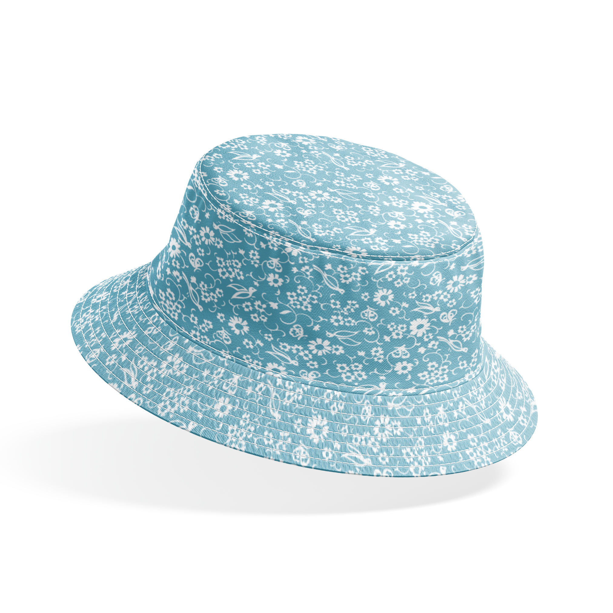 White vintage-style bird and floral silhouettes on a dusty blue background. bucket hat mockup