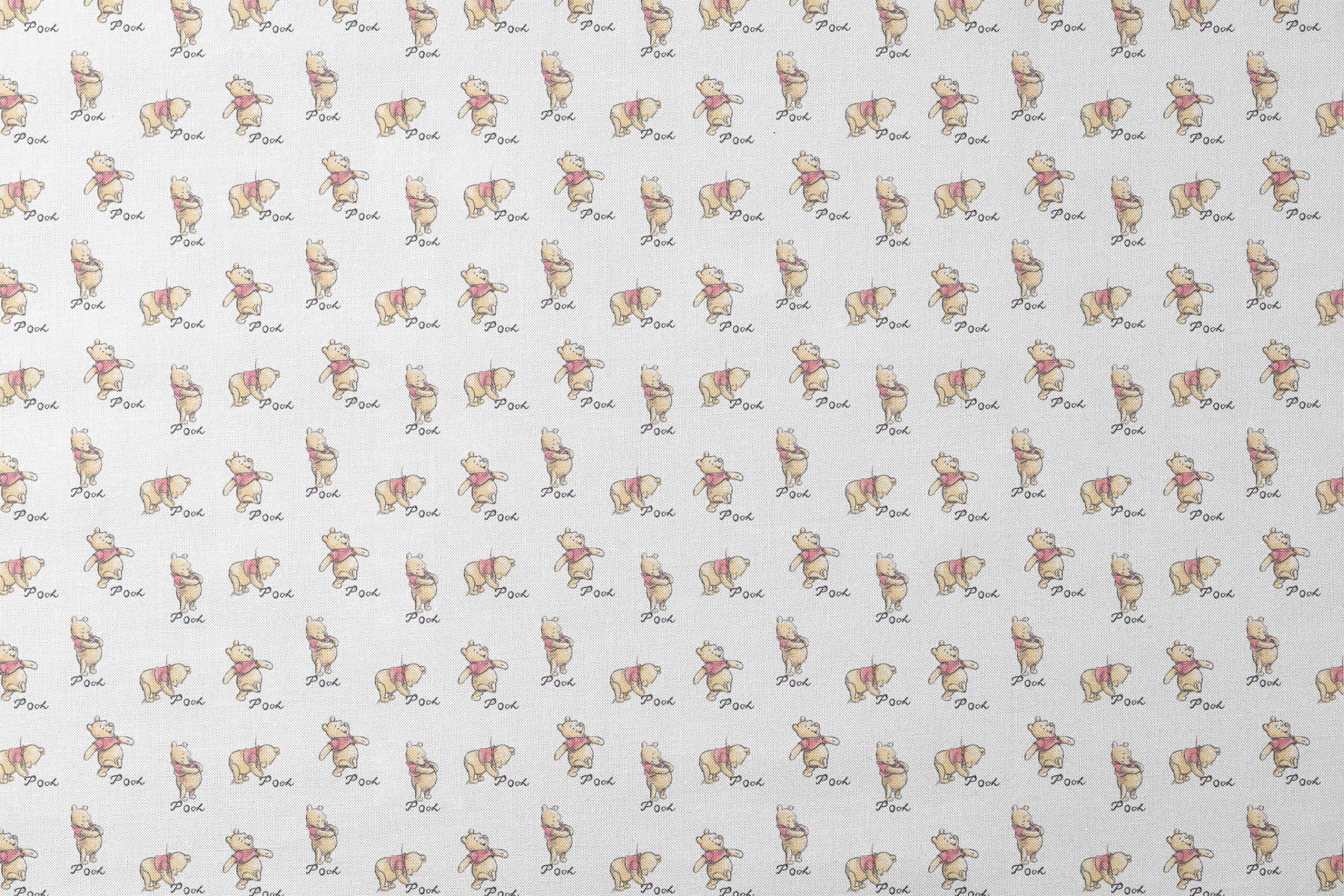 Winnie the Pooh pattern featuring cute yellow bears with red shirts in various poses, labeled "Pooh designs flat mockup