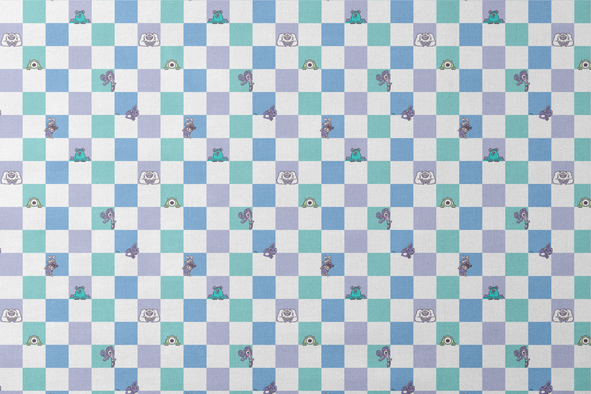 Monsters Inc characters on a checkered pattern of white, mint green, light purple, and blue squares designs flat mockup