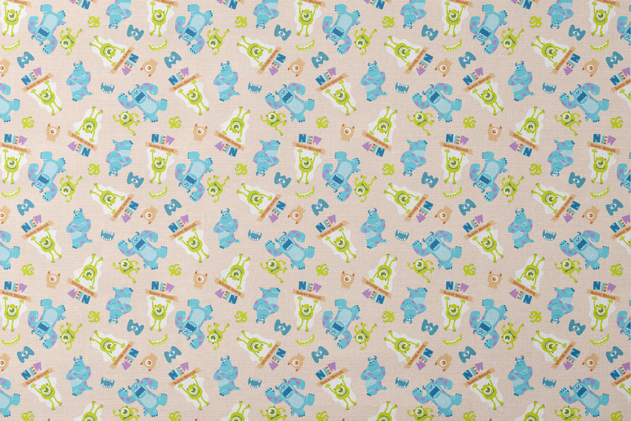Colorful Monsters Inc pattern with Mike and Sully characters on peach background with scattered letters designs flat mockup