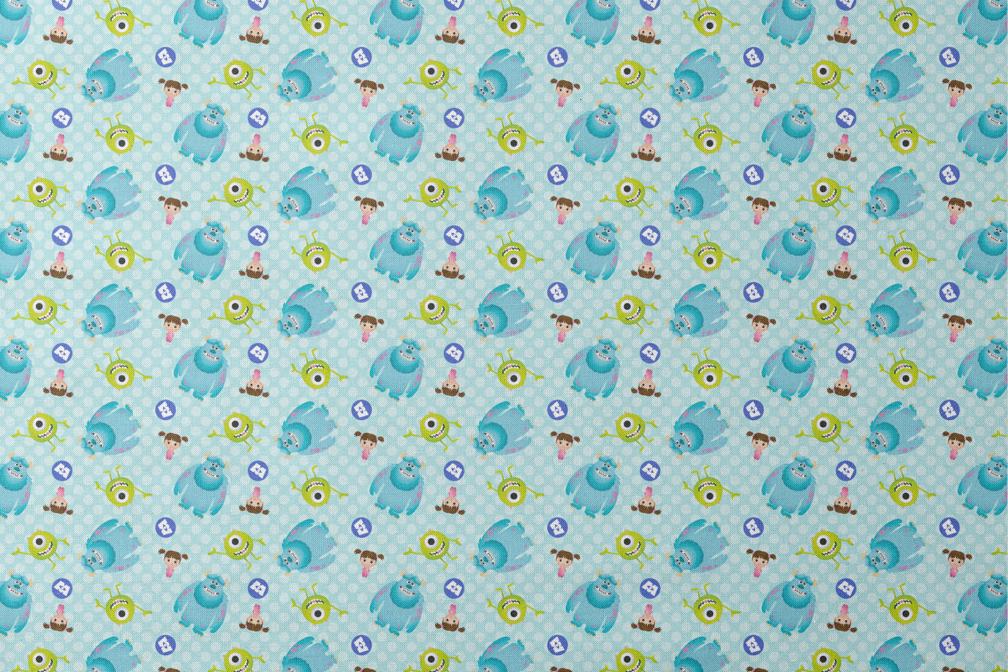 Cartoon Monsters Inc characters on light blue polka dot background designs flat mockup