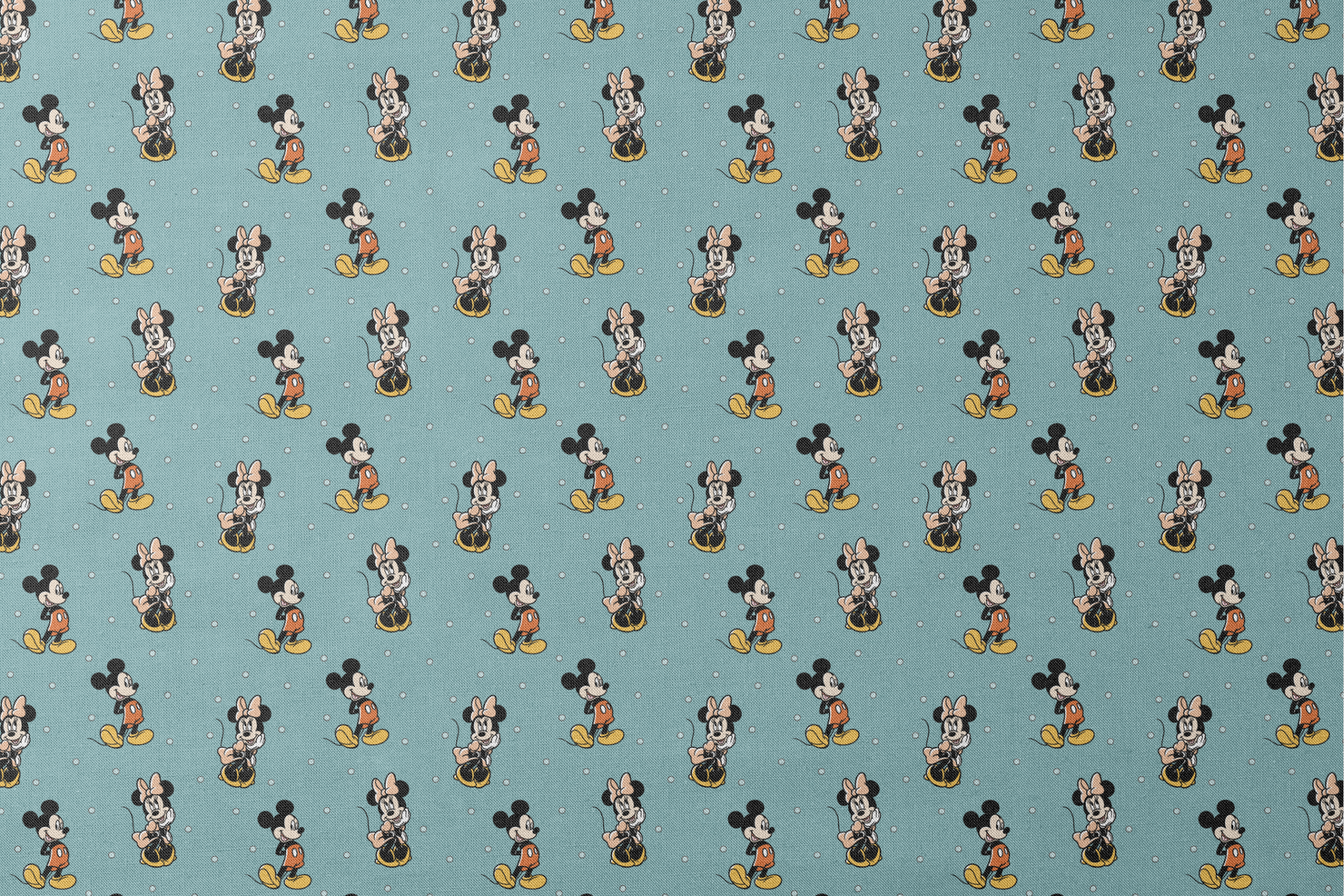 Cartoon pattern of Mickey and Minnie Mouse characters on light blue background with white dots designs flat mockup