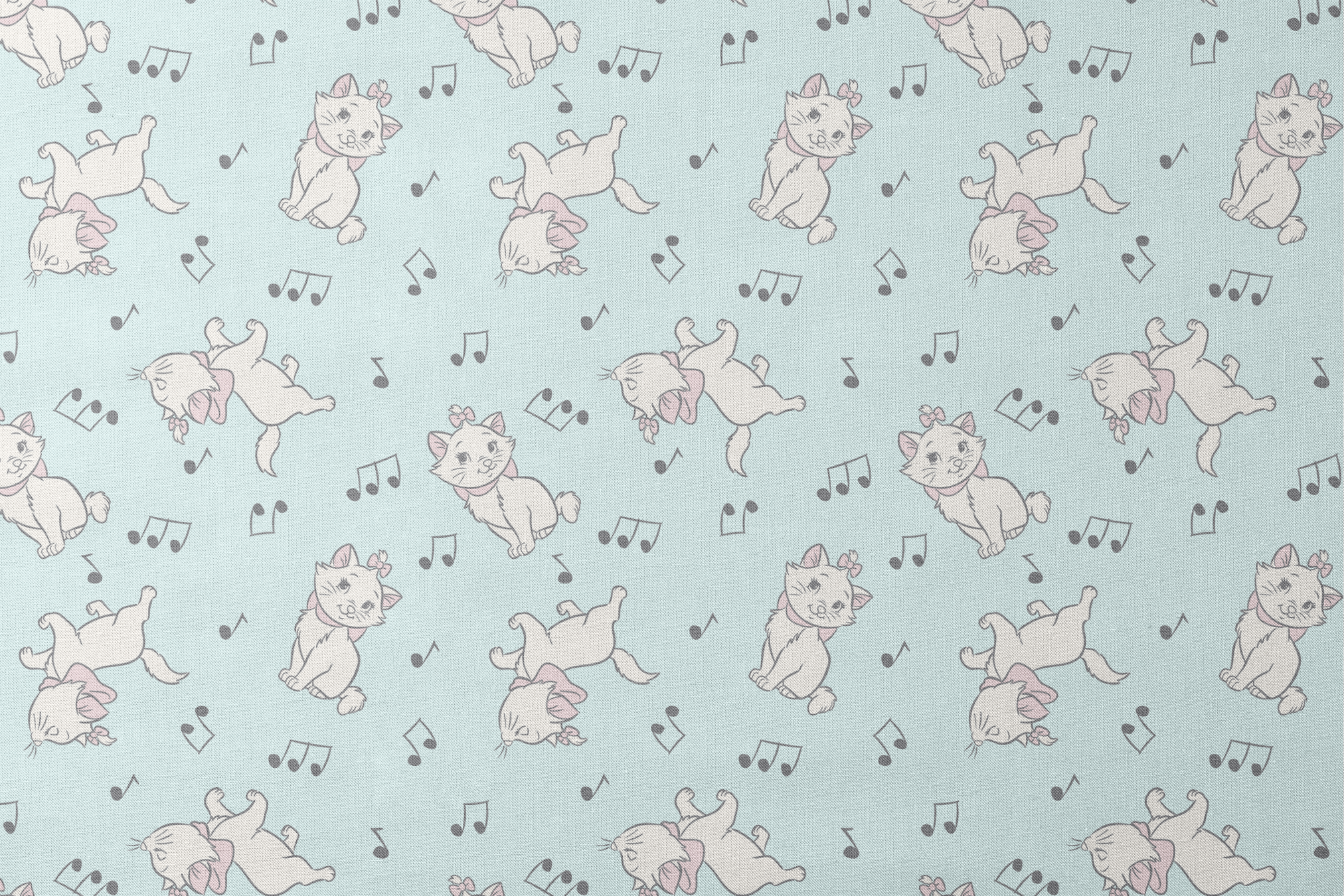 White kittens with pink bows playing among musical notes on a light mint background designs flat mockup