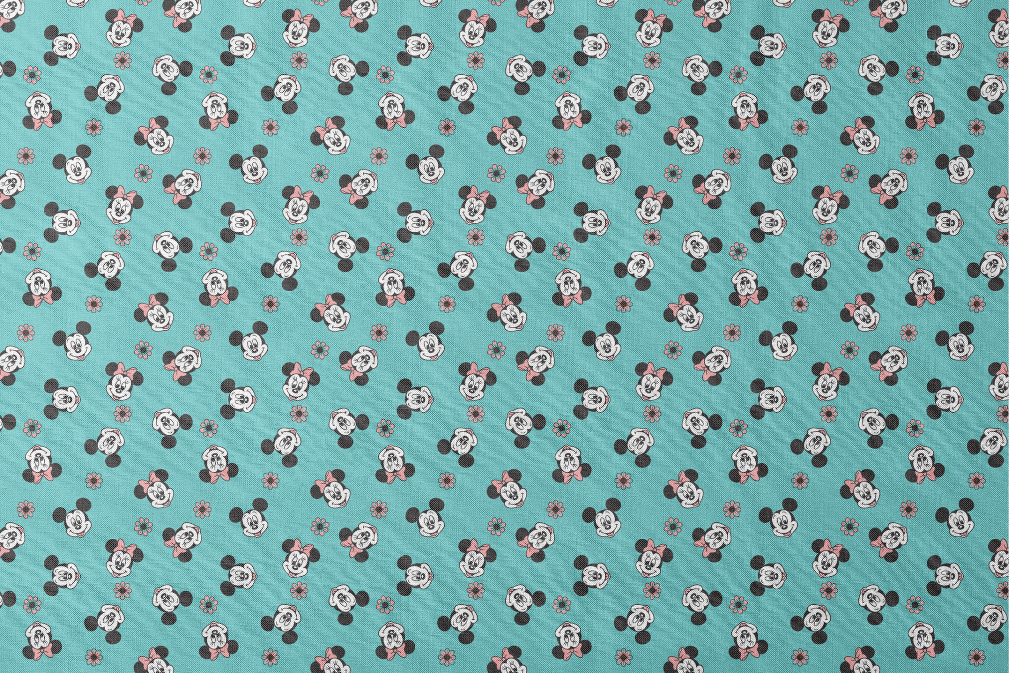 Mickey and Minnie Mouse cartoon faces scattered on turquoise background with small flowers designs flat mockup