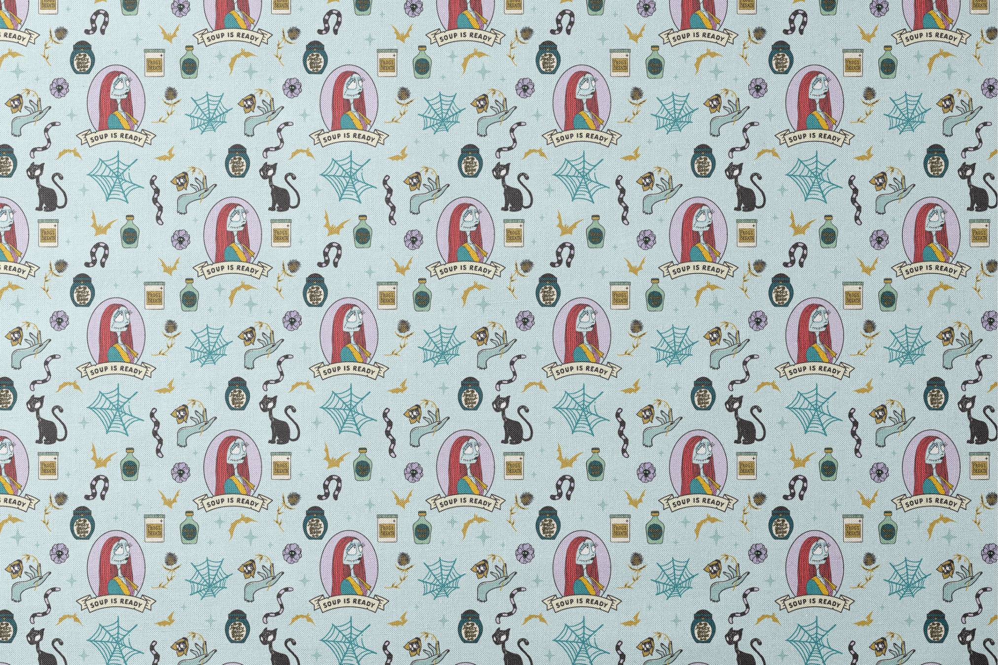 Whimsical pattern with skeletal figure in oval frame, black cats, spiderwebs, potion bottles, and "Soup is Ready" banners on light blue background. designs flat mockup