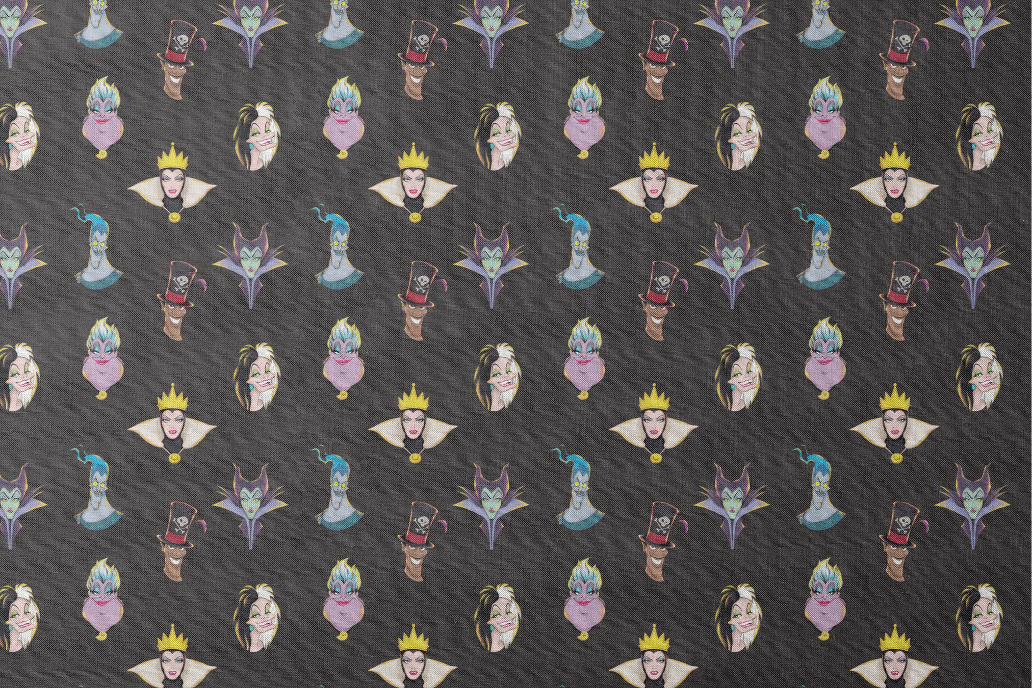 Illustrated Disney villain heads on black background including sea witch, evil queen, and others designs flat mockup