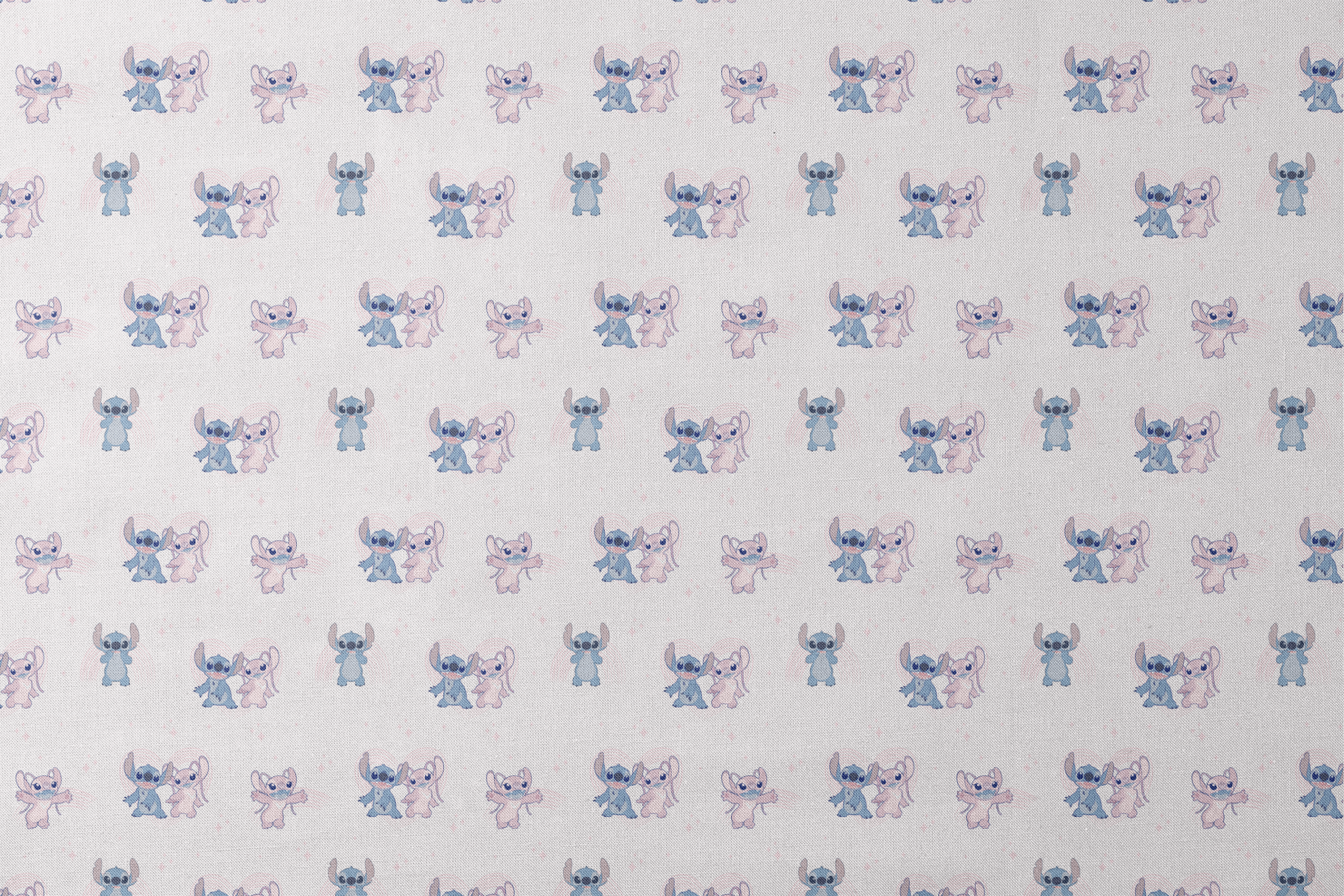 Cartoon pattern of blue and pink Stitch characters from Lilo & Stitch with playful poses on pale background designs flat mockup