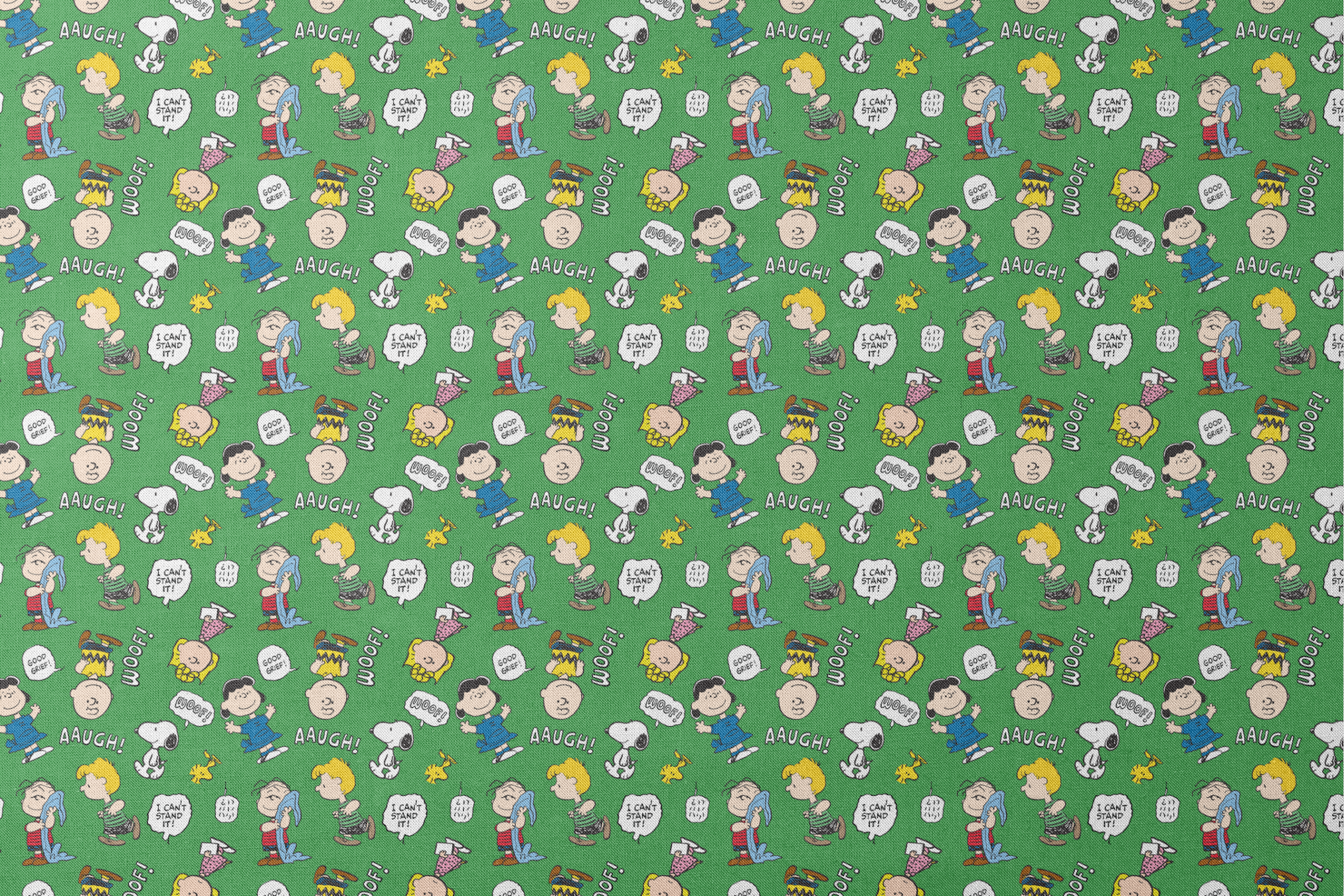 Peanuts comic characters on green background - Snoopy, Woodstock, and gang with speech bubbles like "AAUGH!" and "I CAN'T STAND IT! designs flat mockup