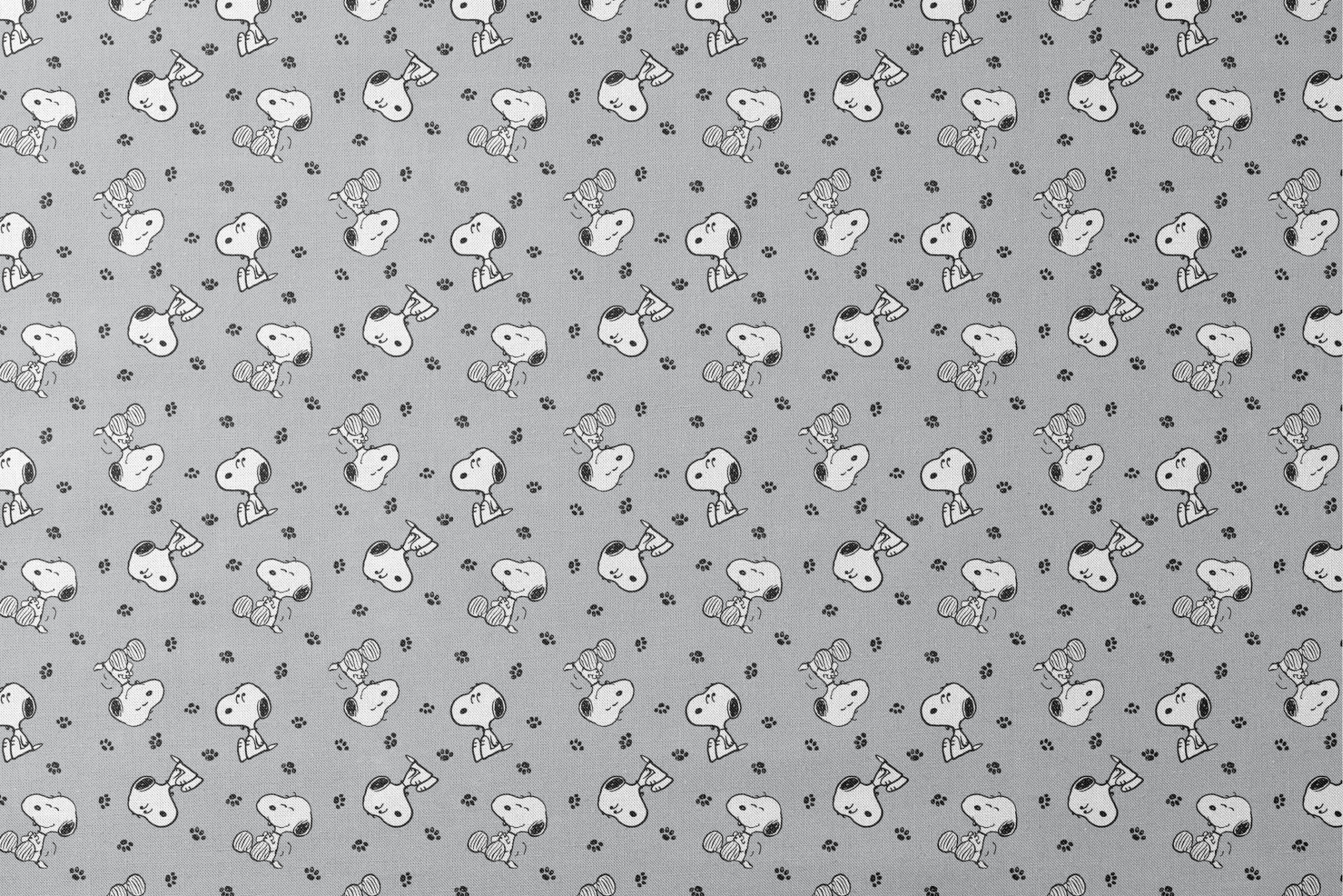 Snoopy with black ears on gray background with paw prints, in various poses designs flat mockup