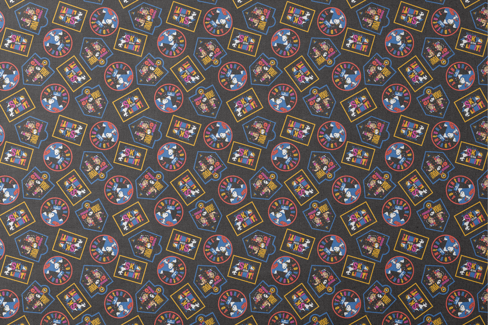 Colorful Peanuts character patches in various shapes on black background, featuring animated figures in vibrant colors designs flat mockup