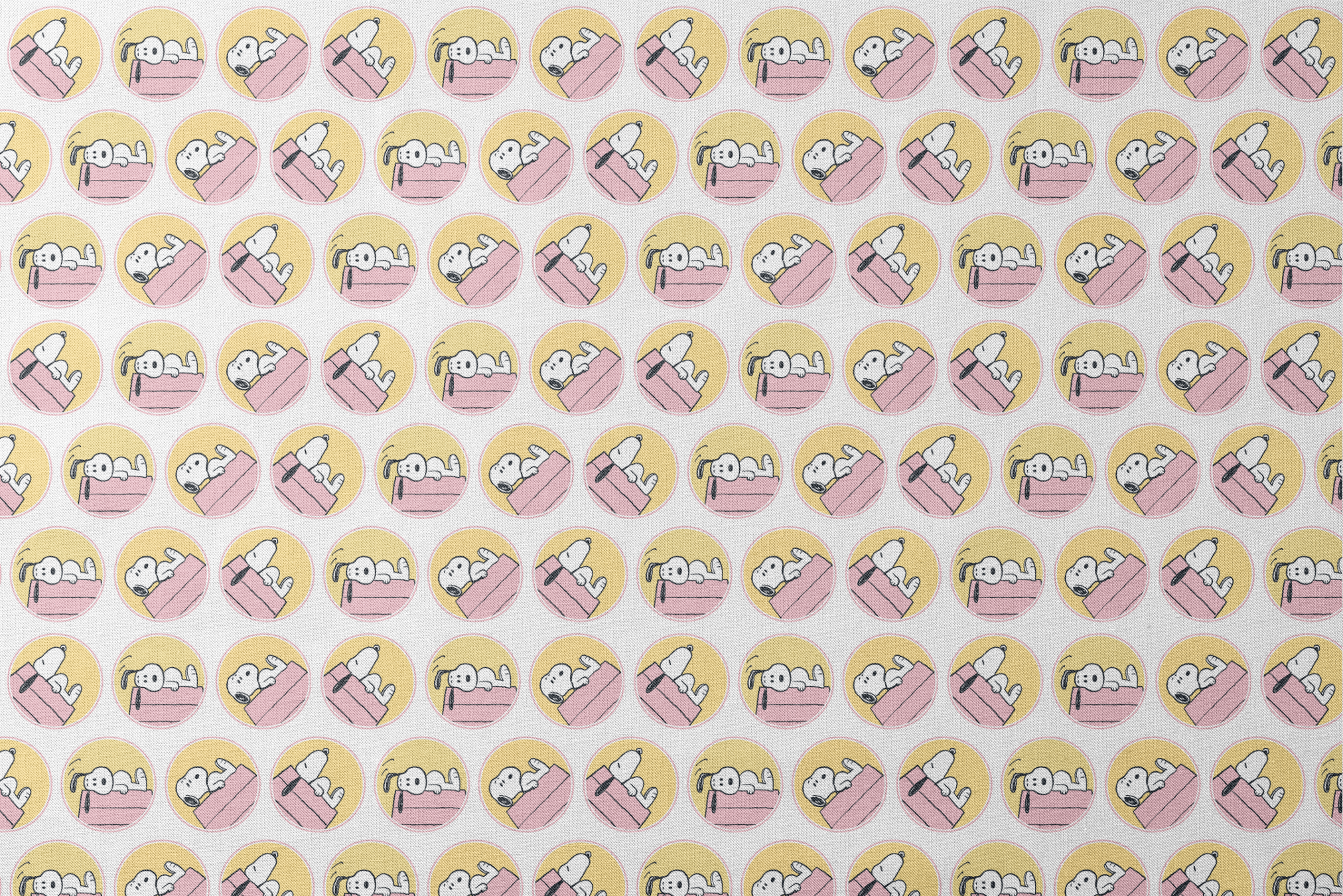 Snoopy lounging on pink doghouse roof in various poses, arranged in circular yellow frames designs flat mockup