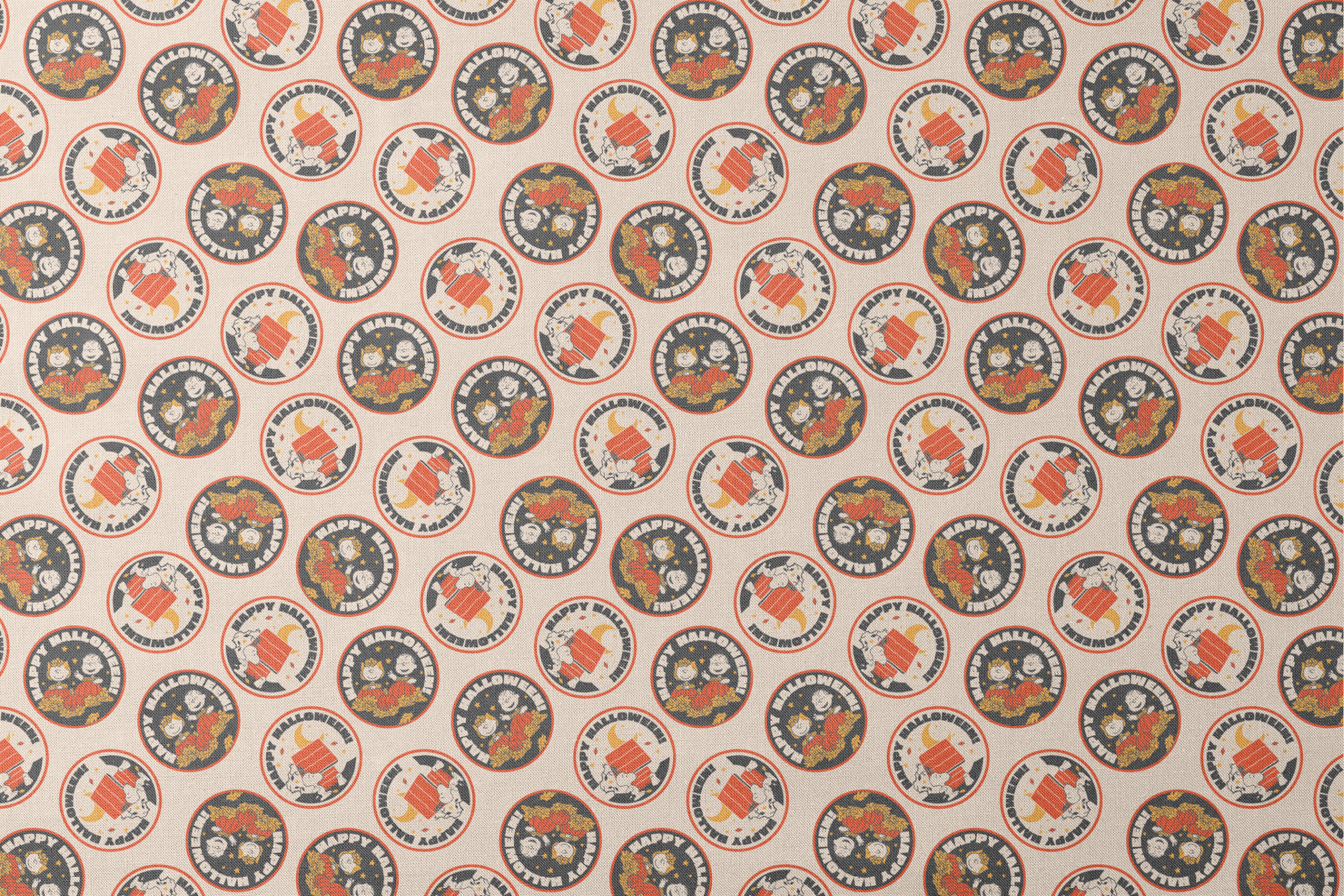 Peanuts Halloween pattern with circular badges featuring characters and "Happy Halloween" text on beige background designs flat mockup