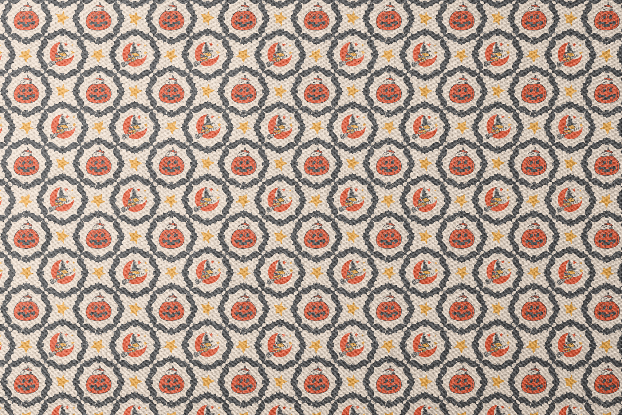 Peanuts Halloween pattern with orange jack-o'-lanterns, crescent moons with witch hats, yellow stars, and black bat borders on cream background designs flat mockup