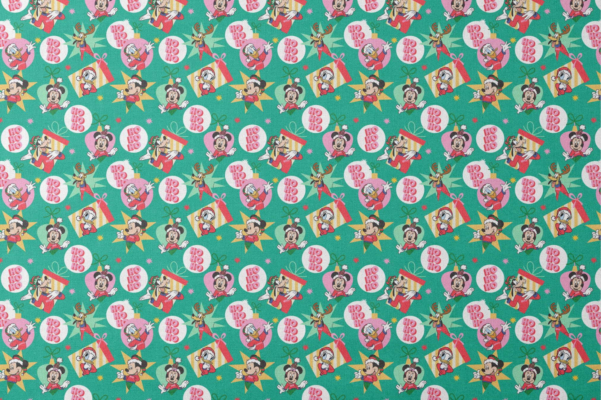 Festive Disney characters on green holiday pattern with "Ho Ho Ho" text and Christmas ornaments designs flat mockup