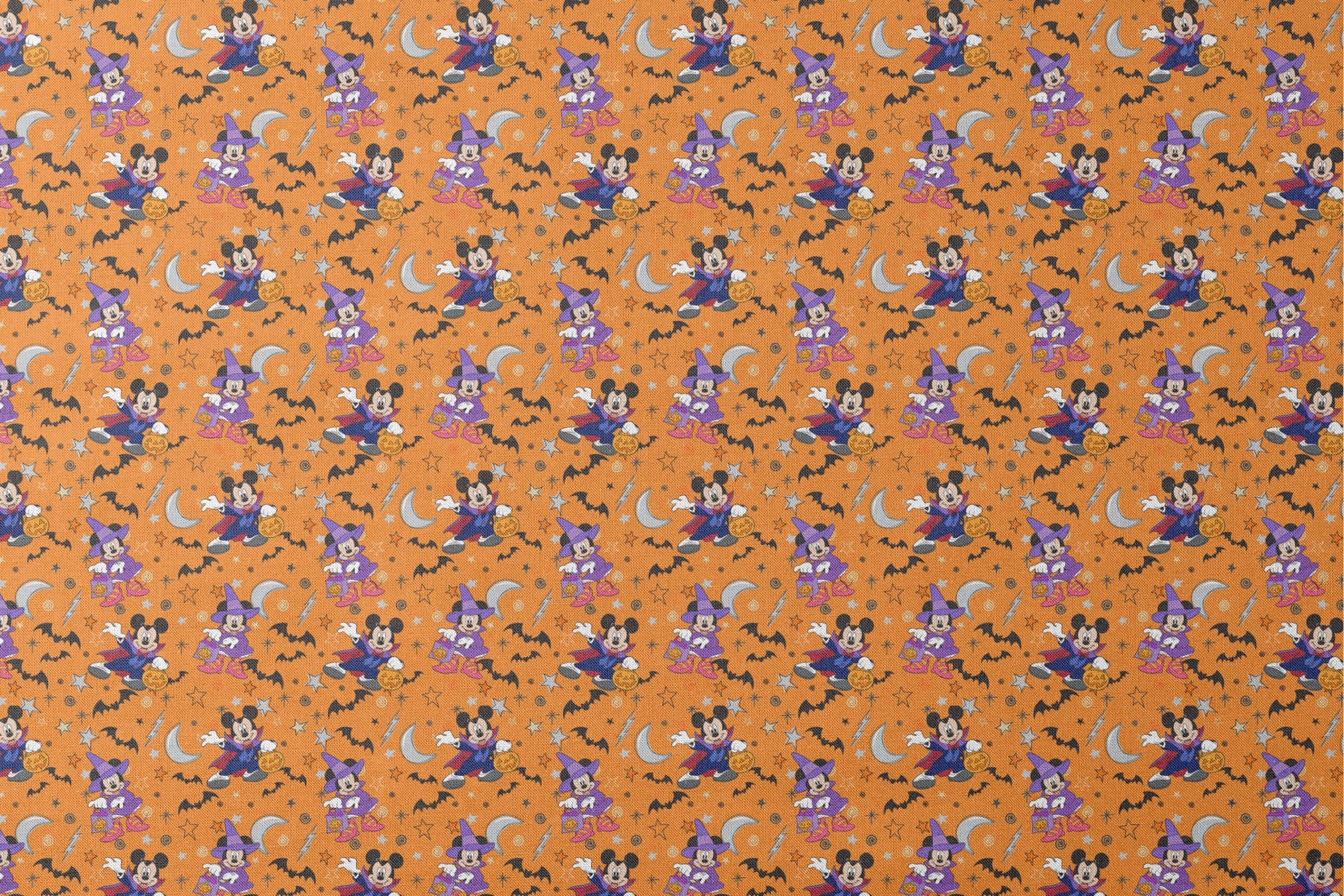 Halloween-themed cartoon pattern with Disney characters in costumes, bats, stars, moons, and ghosts on orange background. designs flat mockup
