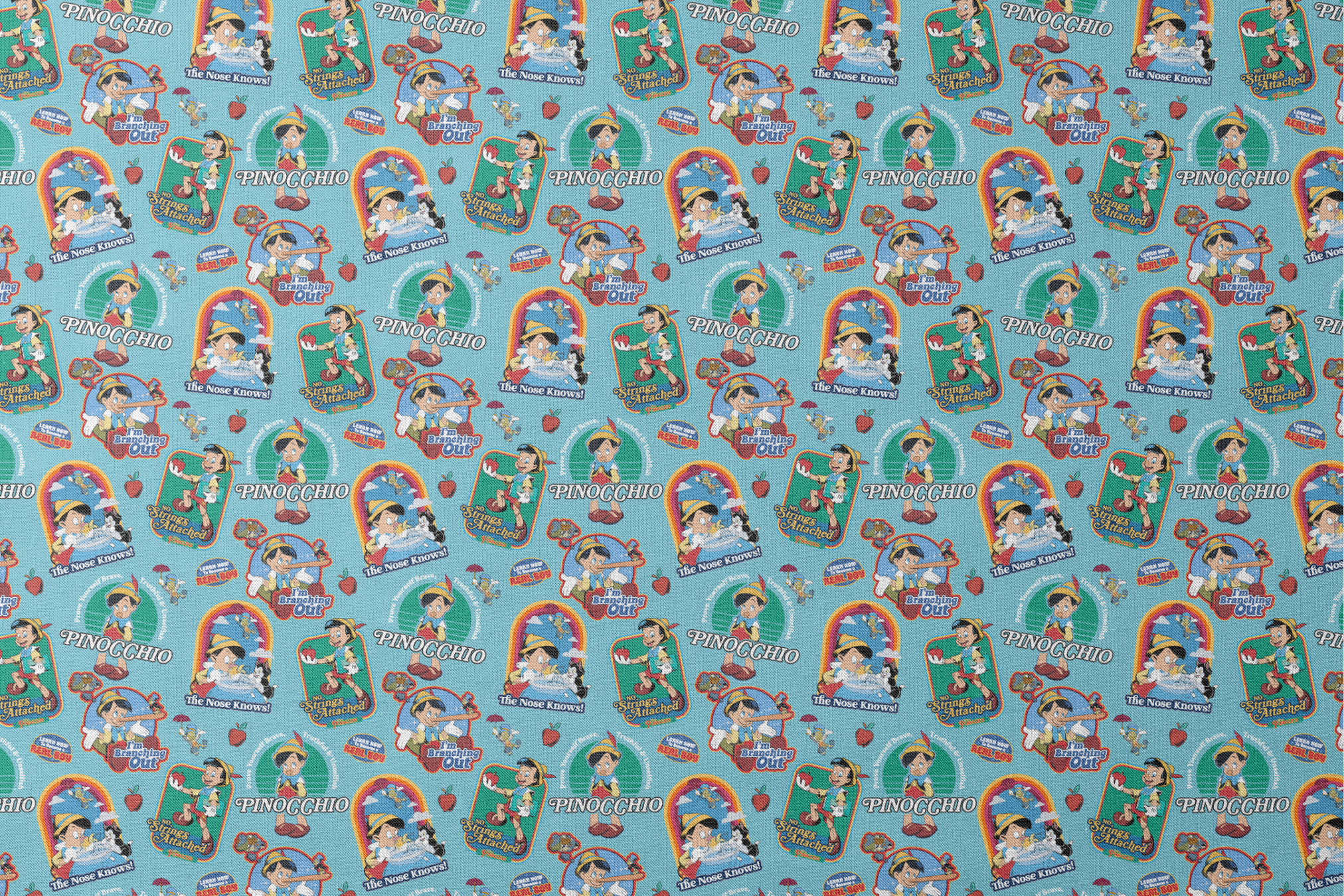 Colorful Pinocchio cartoon pattern featuring puppet characters, slogans, and red apples on teal background designs flat mockup