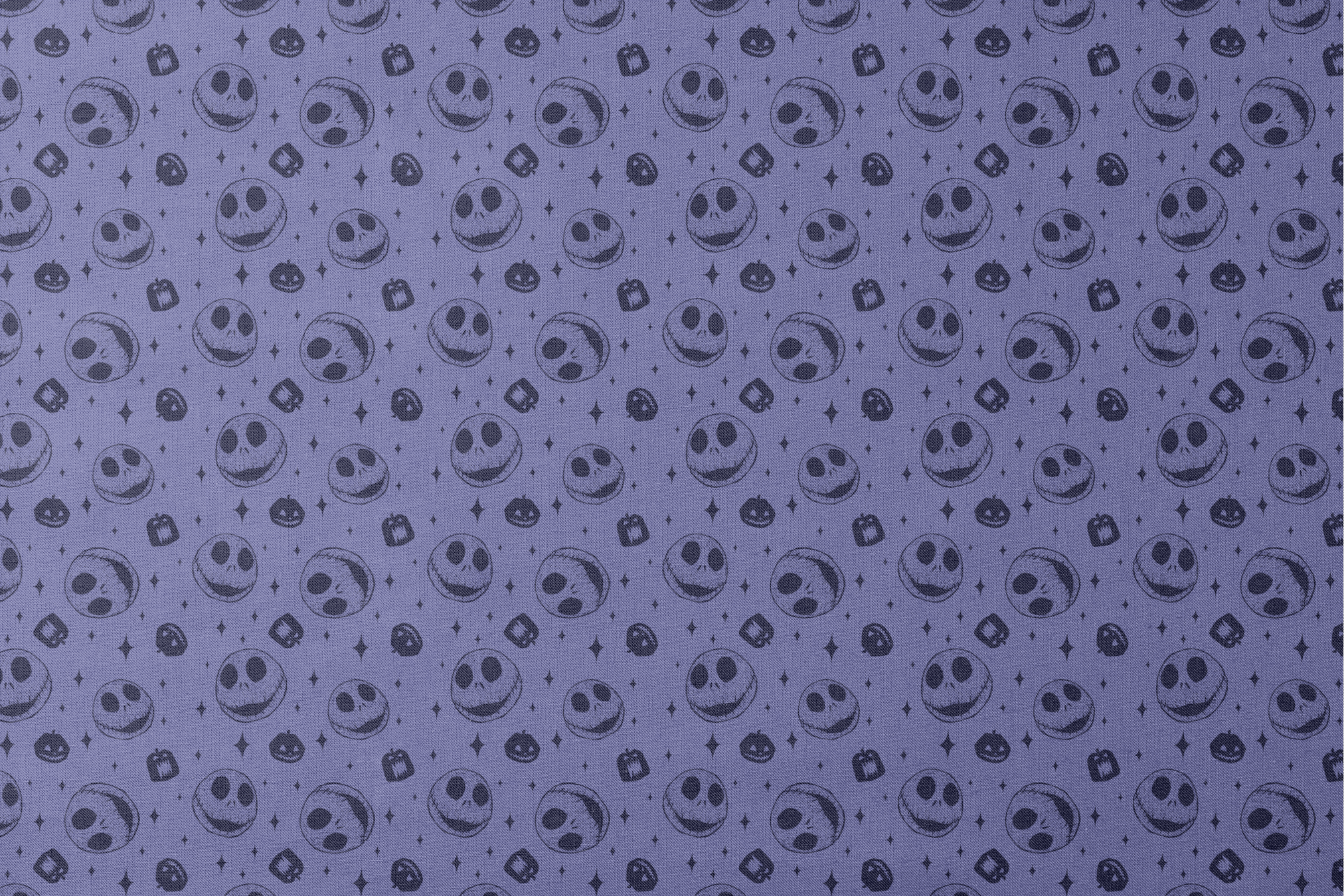 Nightmare Before Christmas skull and pumpkin pattern on purple background with black star shapes designs flat mockup