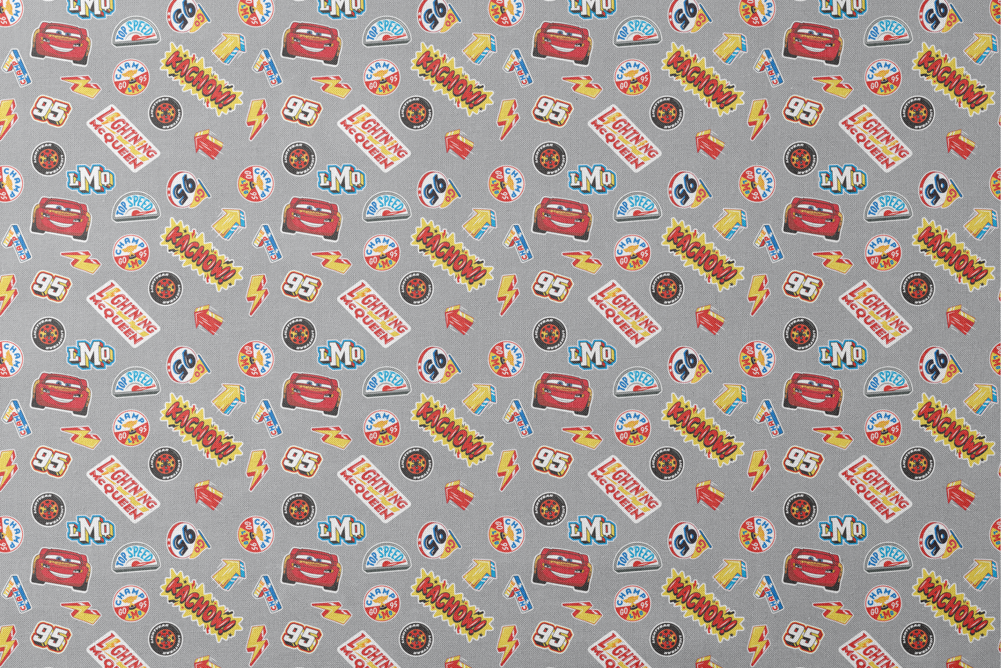 Colorful Disney Cars movie stickers featuring Lightning McQueen, racing logos, and numbers on gray background designs flat mockup