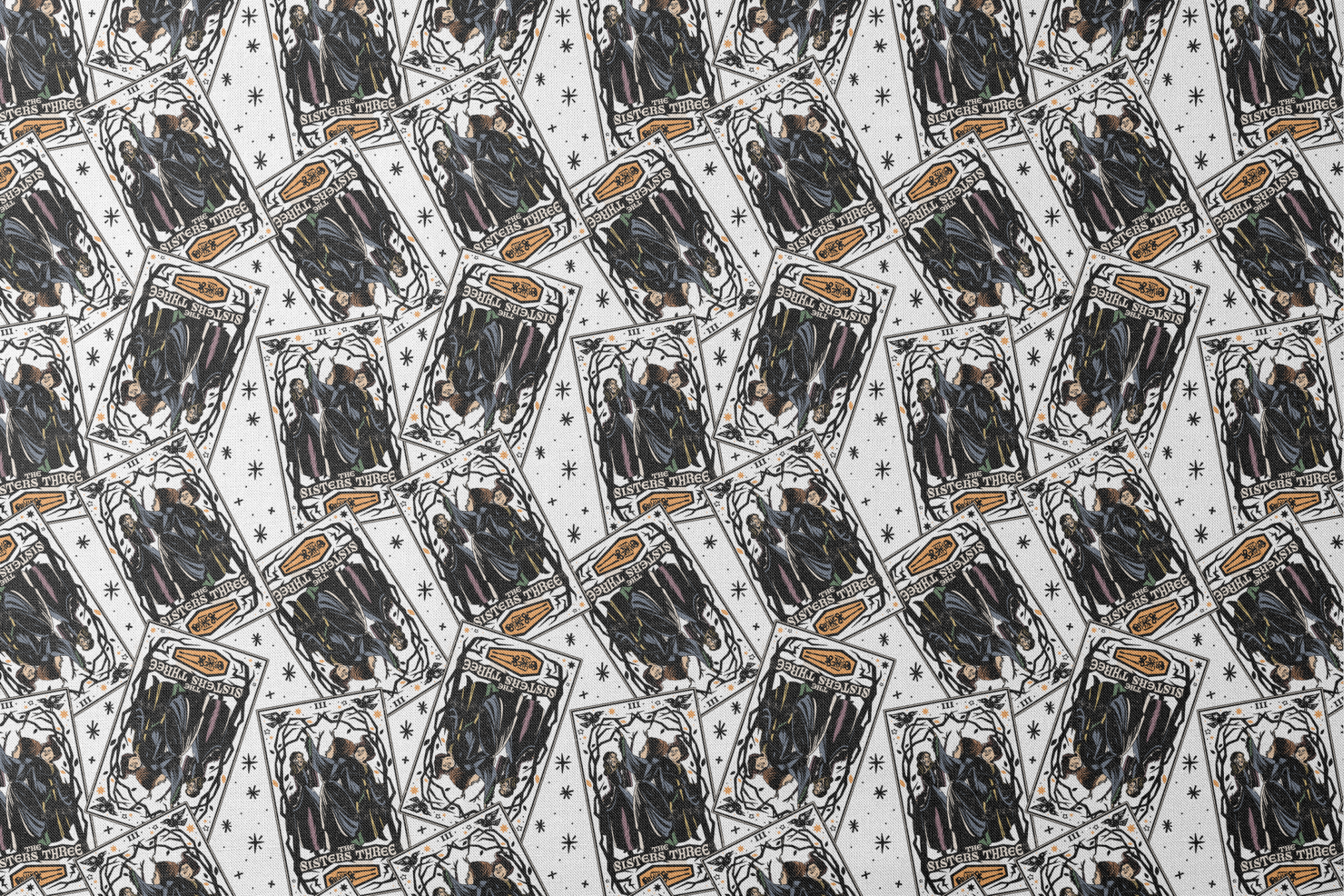 Scattered Hocus Pocus cards showing robed figures against white background with stars designs flat mockup