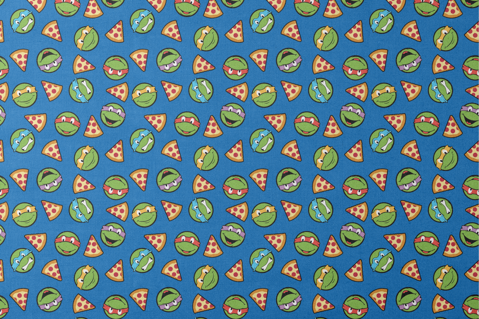 Teenage Mutant Ninja Turtle faces with colored masks and pizza slices pattern on blue background designs flat mockup