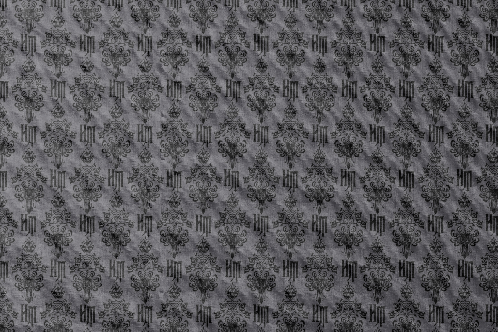 Dark gray background with black ornate damask pattern featuring decorative flourishes and monogram elements designs flat mockup