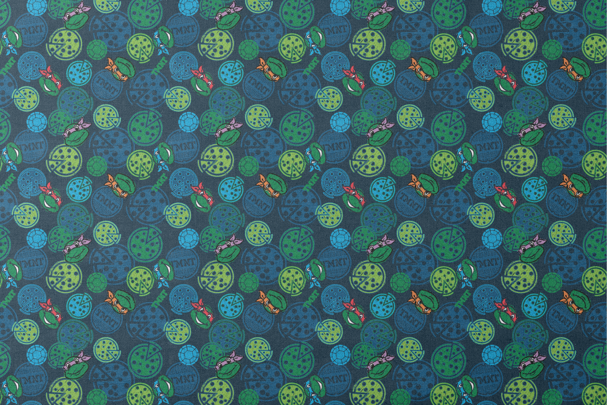 Teenage Mutant Ninja Turtles pattern with cartoon character heads and green/blue pizza circles designs flat mockup