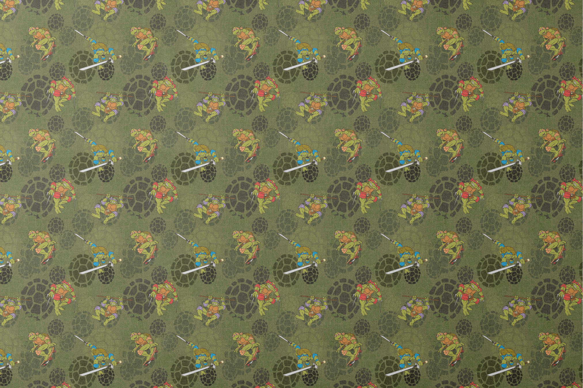 Teenage Mutant Ninja Turtles characters in action poses on green background with turtle shell patterns designs flat mockup