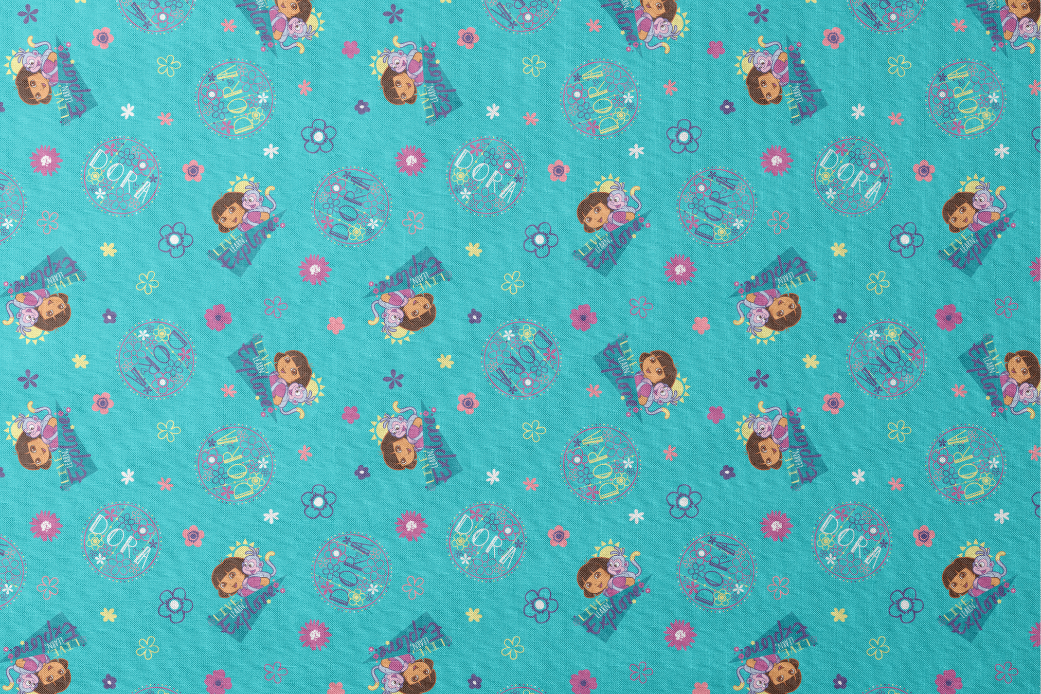 Colorful teal pattern with Dora the Explorer characters, decorative circles, flowers, and triangular shapes in pink, purple, and blue designs flat mockup