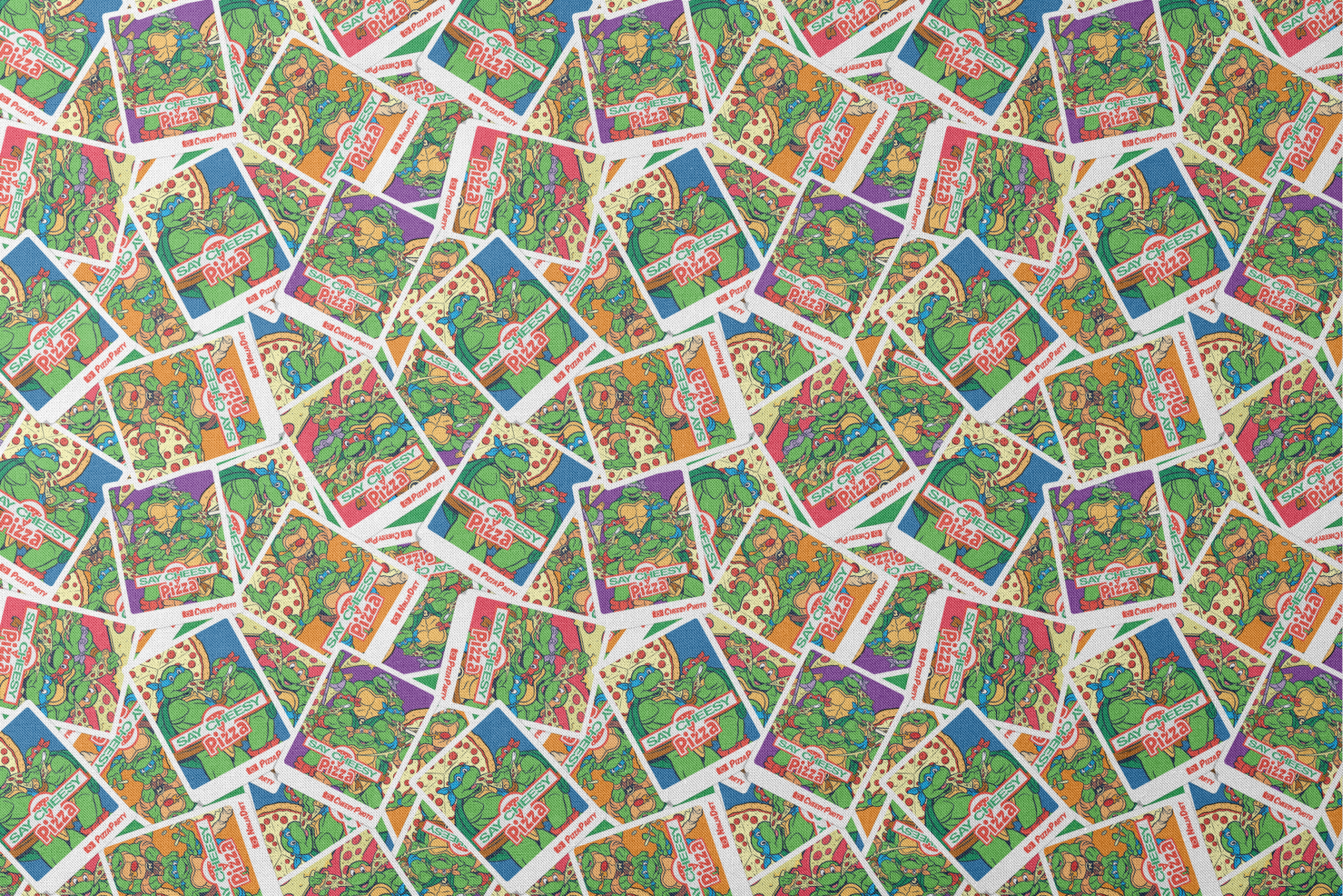 Scattered vintage Teenage Mutant Ninja Turtles trading cards with colorful comic-style artwork designs flat mockup