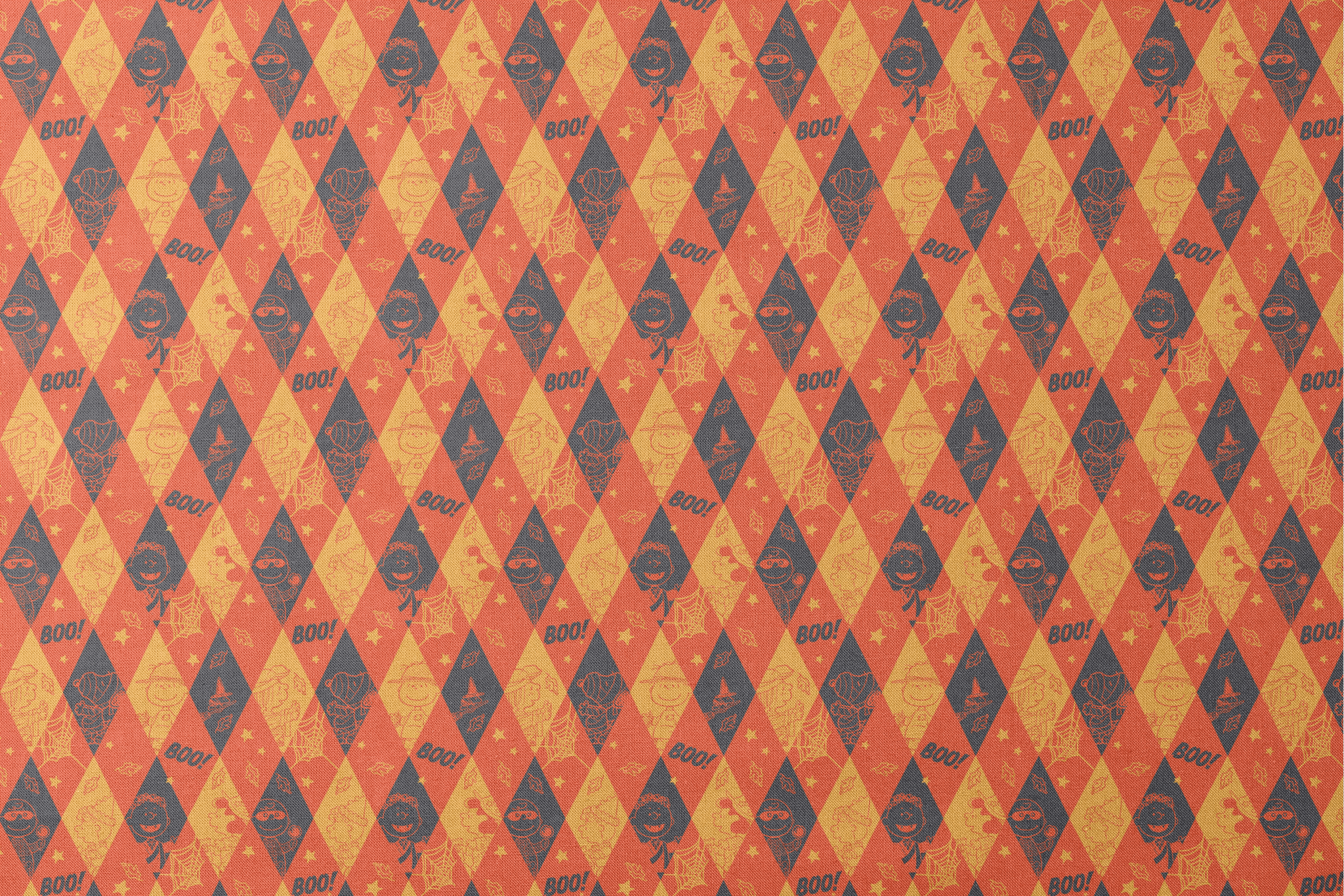 Peanuts Halloween pattern with diamond shapes in orange, yellow, and black featuring Peanuts characters in costumes, webs, "BOO!" text, and seasonal decorations designs flat mockup