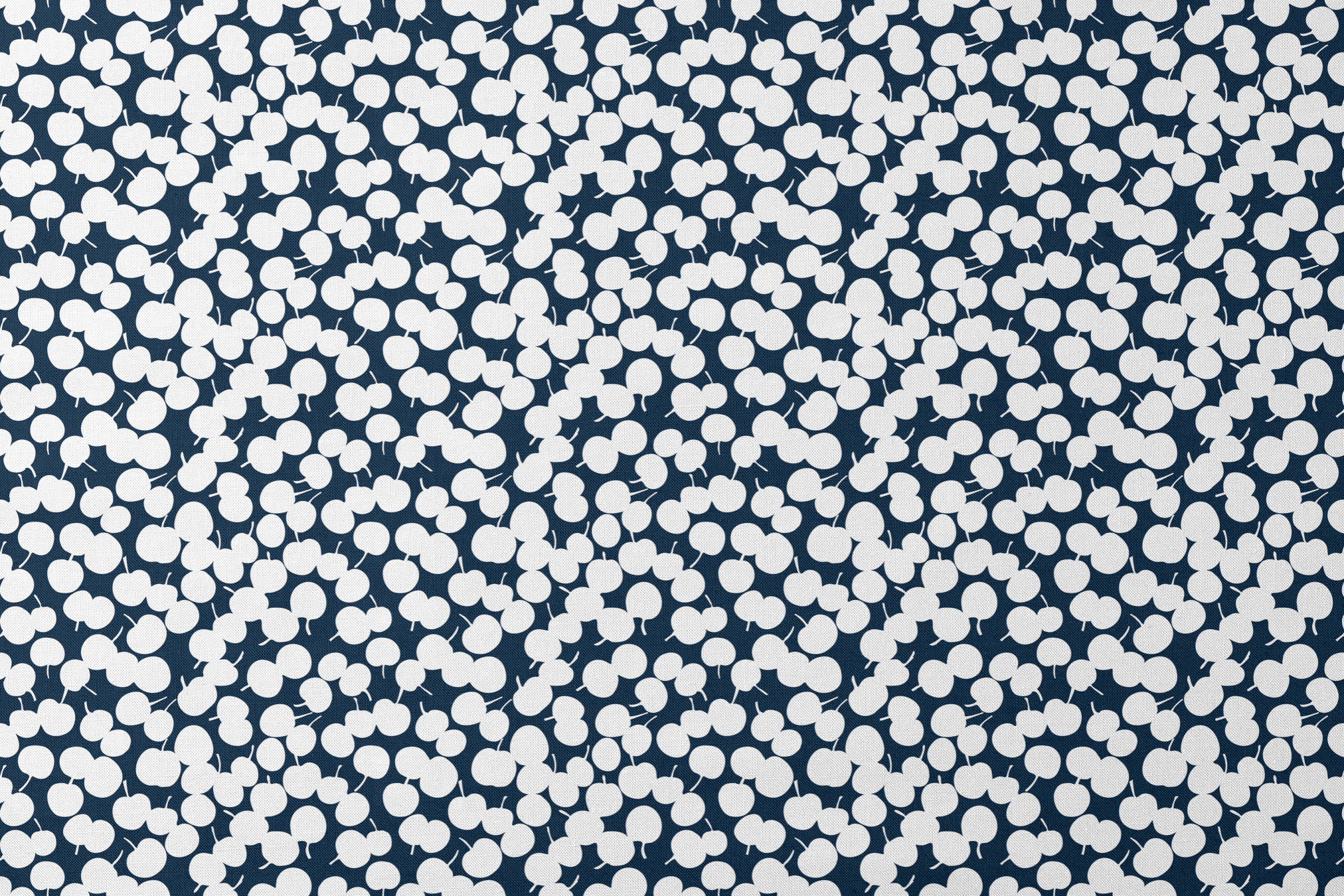 White cherry silhouettes scattered across a deep navy blue background in a playful pattern designs flat mockup