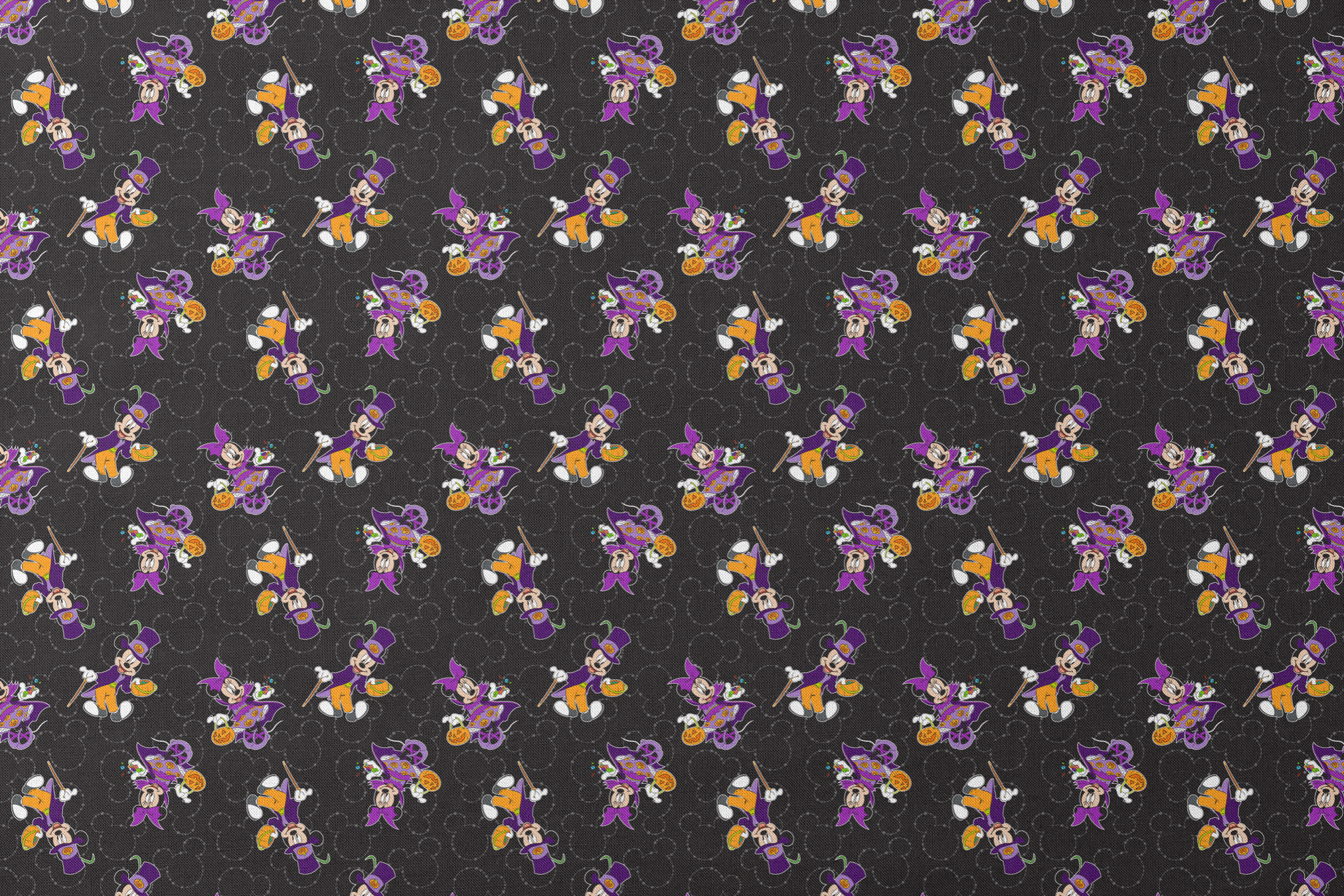Mickey and Minnie in Halloween costumes on black background with purple, orange, and white details in a scattered pattern designs flat mockup