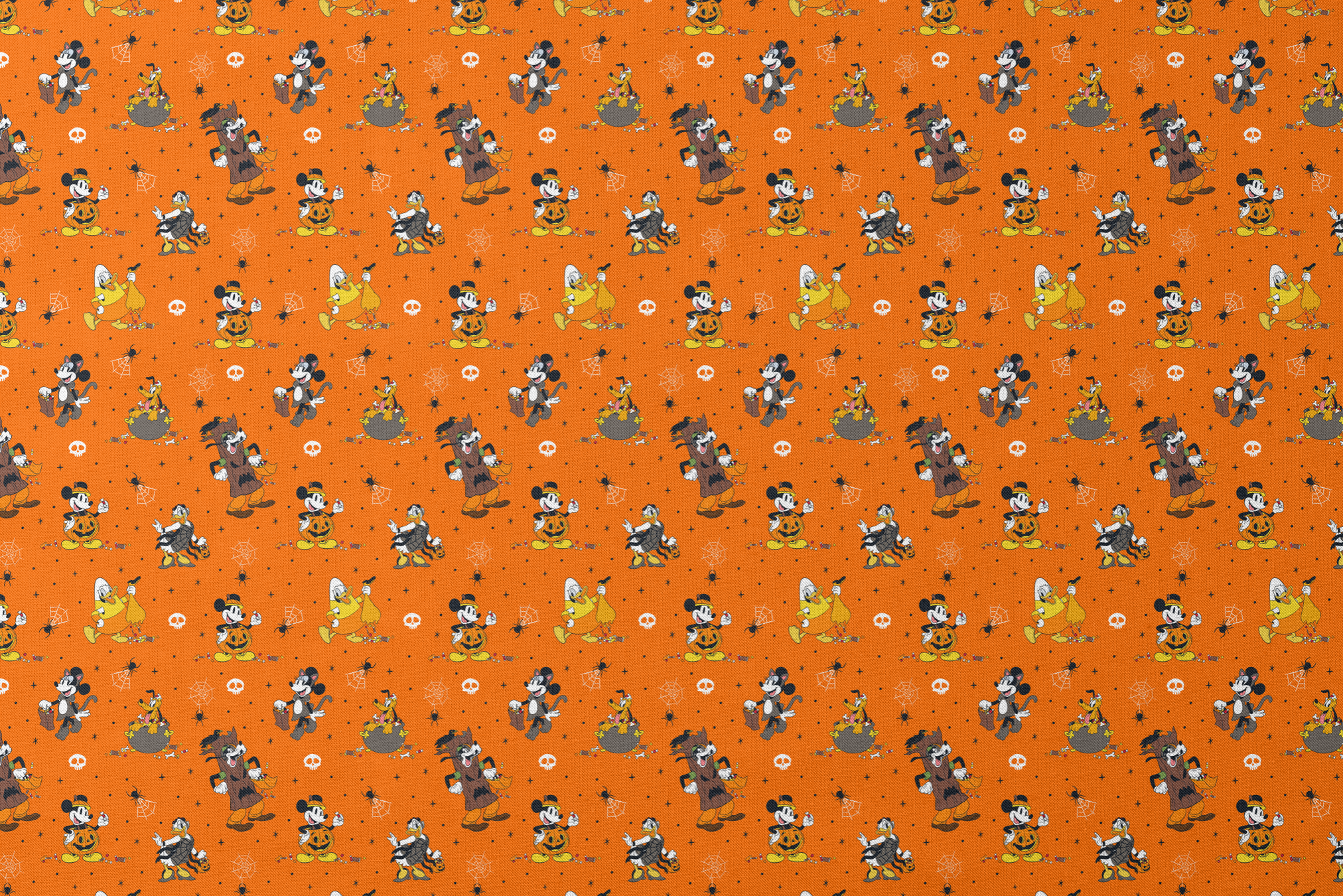 Halloween-themed orange pattern with Disney characters in costumes, spiderwebs, and skulls designs flat mockup