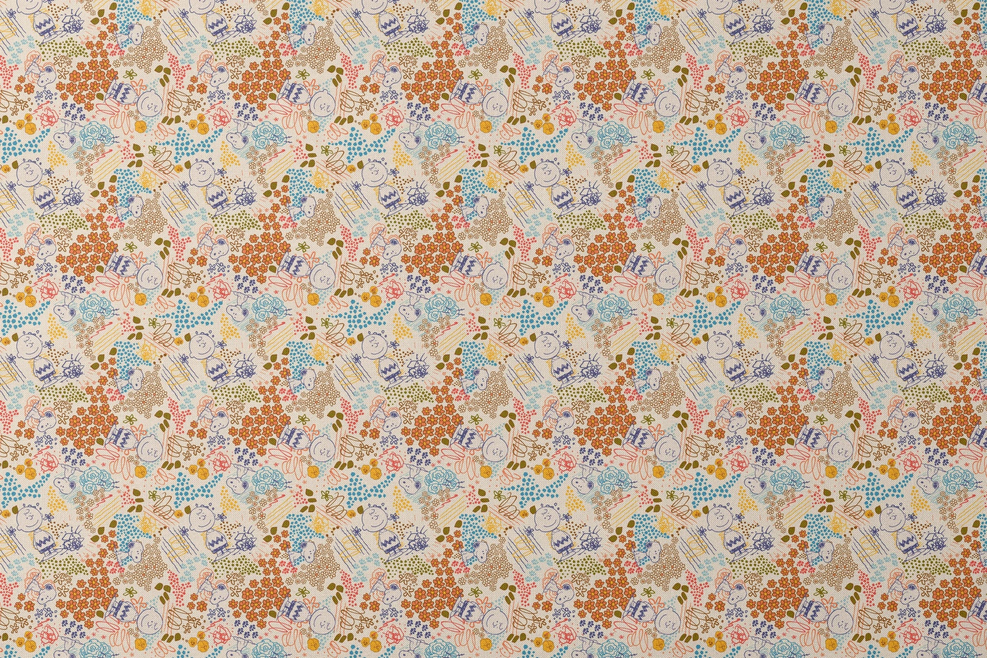 Colorful pattern with Peanuts characters sketches, floral designs, and dots in orange, blue, yellow, and green on a cream background designs flat mockup