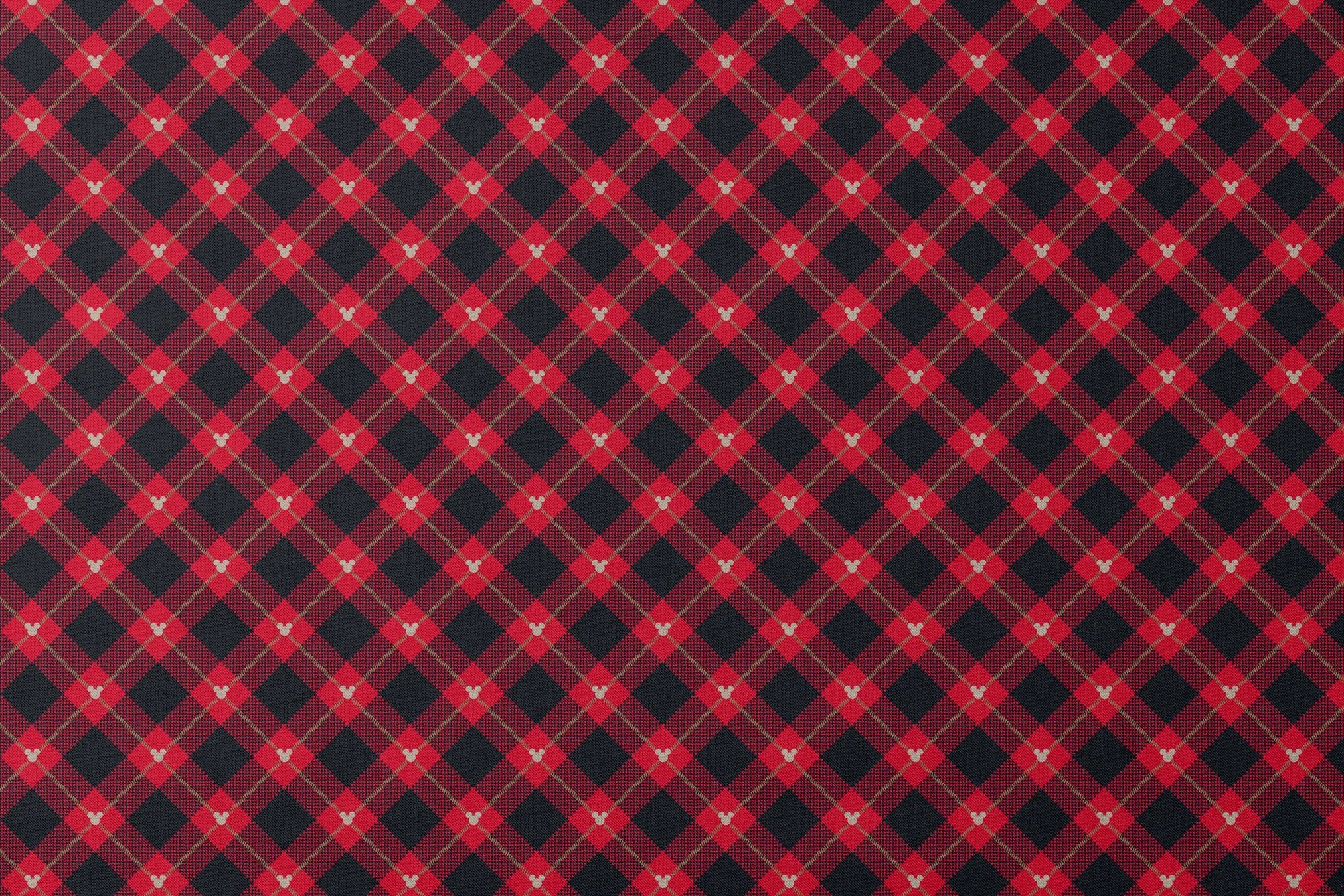Red and black plaid pattern with diagonal gold stripes and small Mickey Mouse silhouettes designs flat mockup