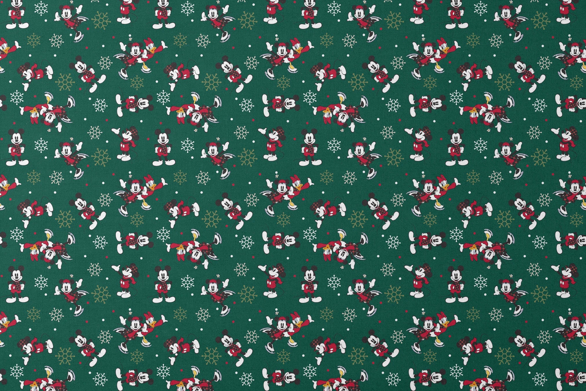 Mickey Mouse Christmas pattern with cartoon characters in winter outfits on green background with snowflakes designs flat mockup