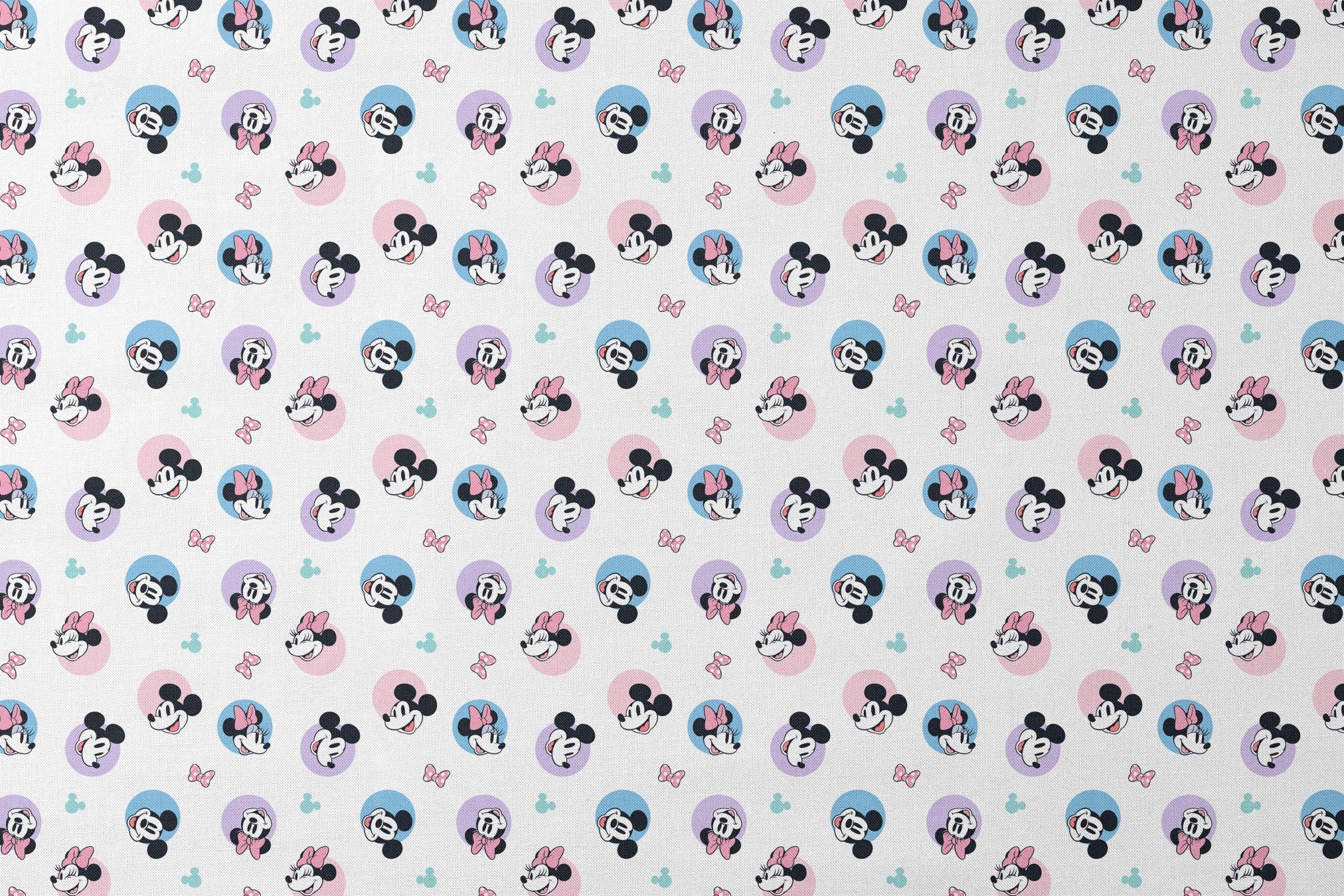 Disney Mickey and Minnie Mouse pattern with character heads on pastel circles, pink bows, and small Mickey icons designs flat mockup