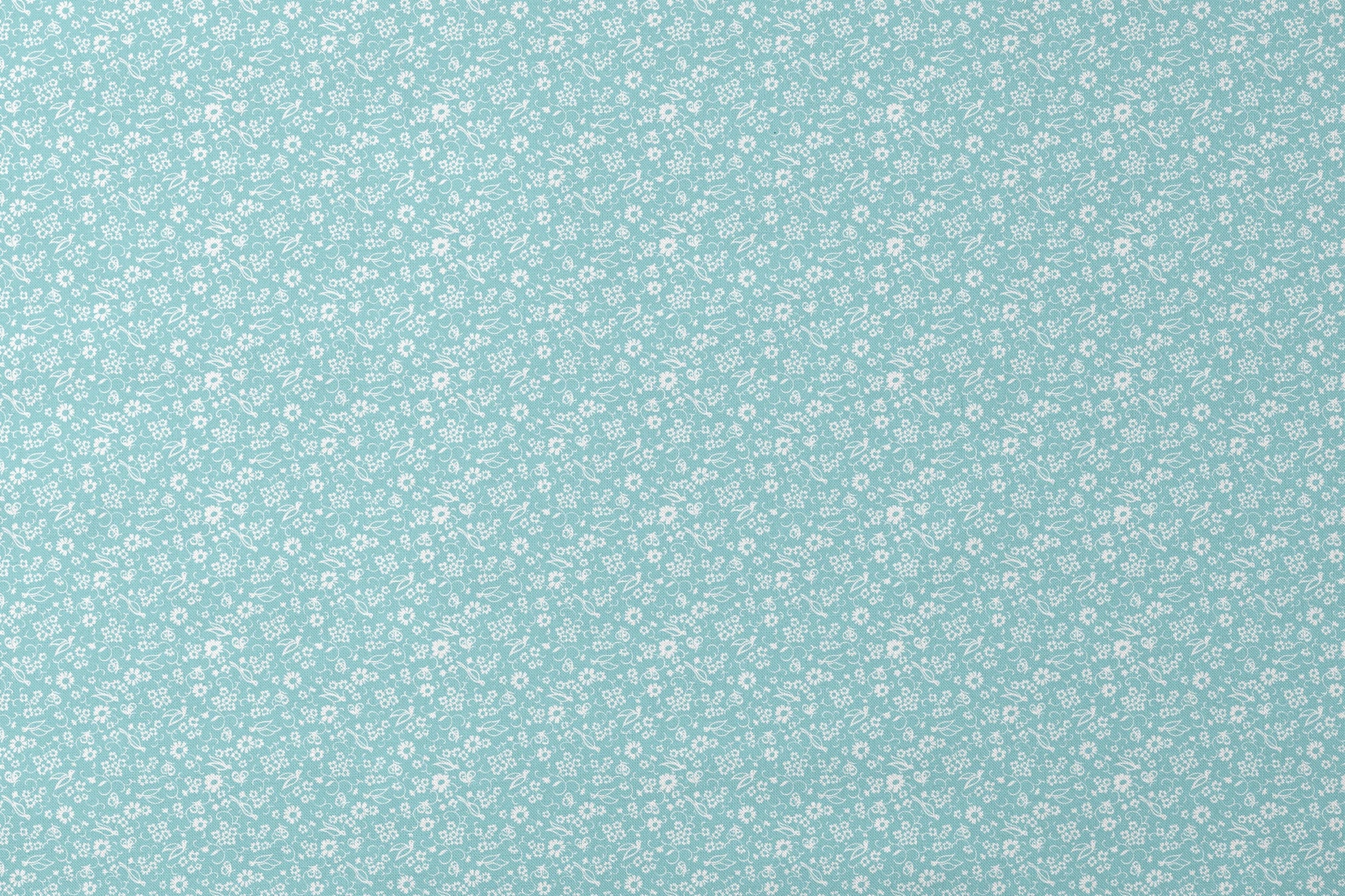 Delicate white floral pattern on a soft turquoise background with swirling leaf motifs designs flat mockup