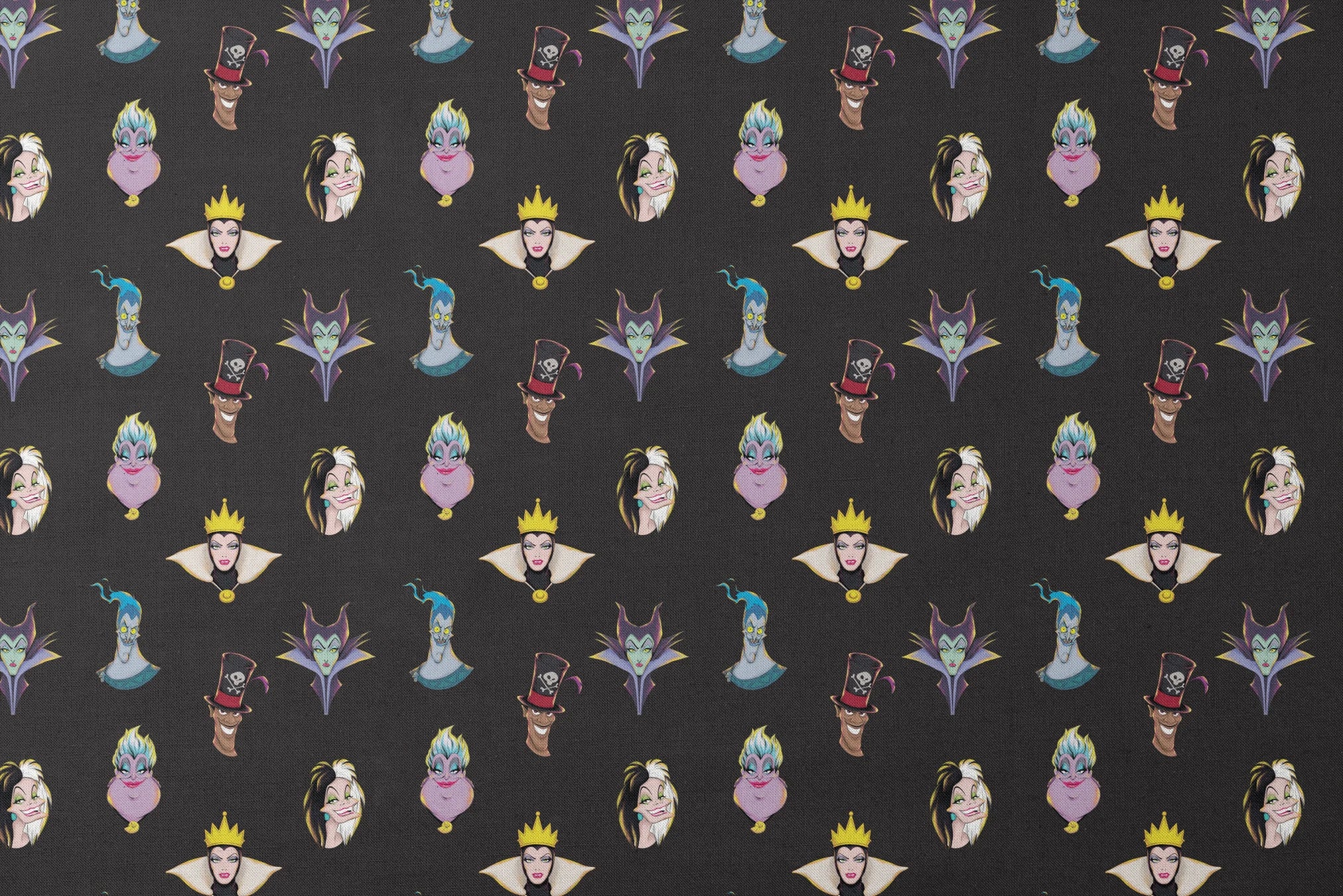 Illustrated Disney villain heads on black background including sea witch, evil queen, and others designs flat mockup