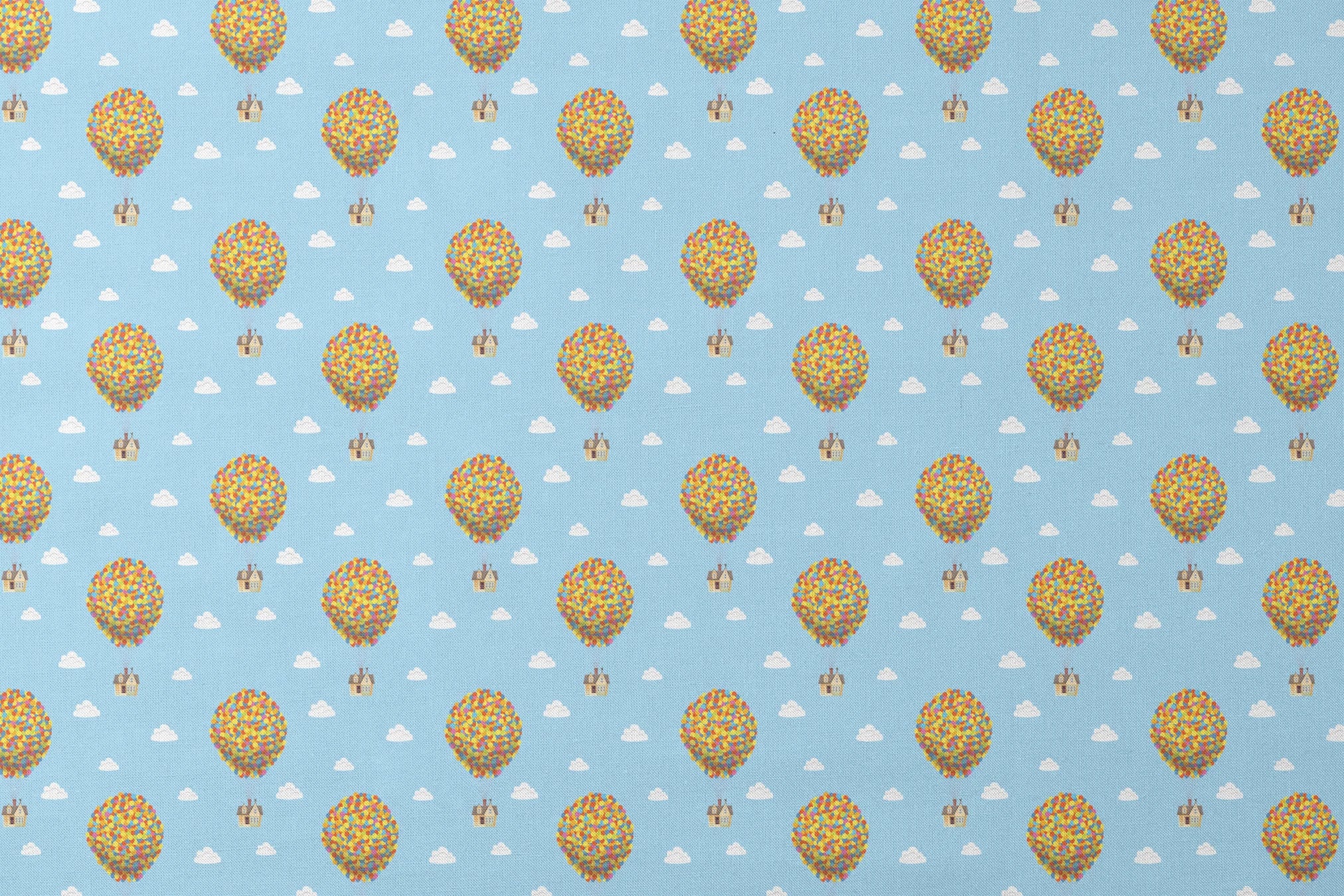 Repeating Up pattern of houses lifted by colorful balloon clusters against a light blue sky with white clouds designs flat mockup
