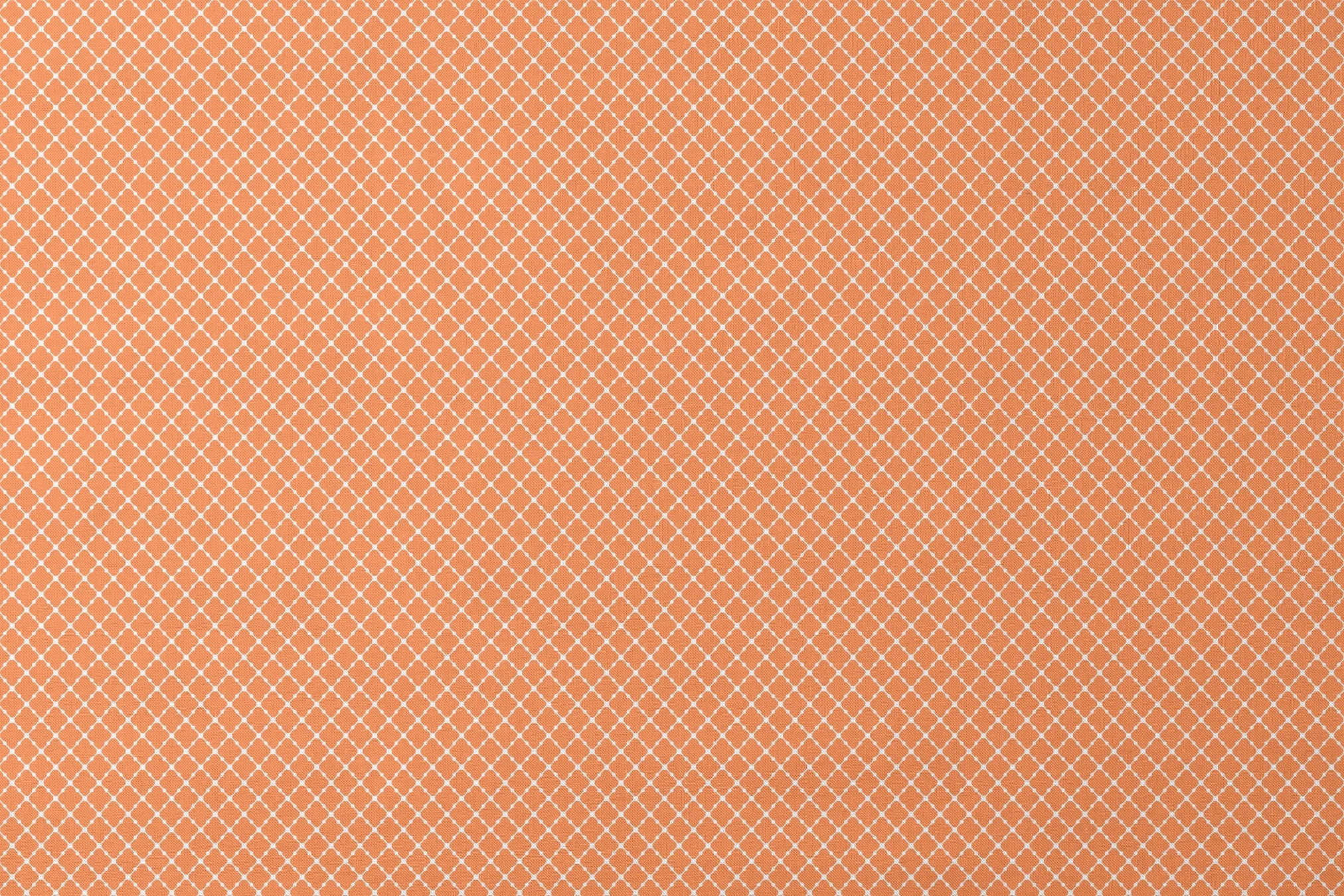 Geometric orange and white pattern with quatrefoil shapes forming a lattice design designs flat mockup