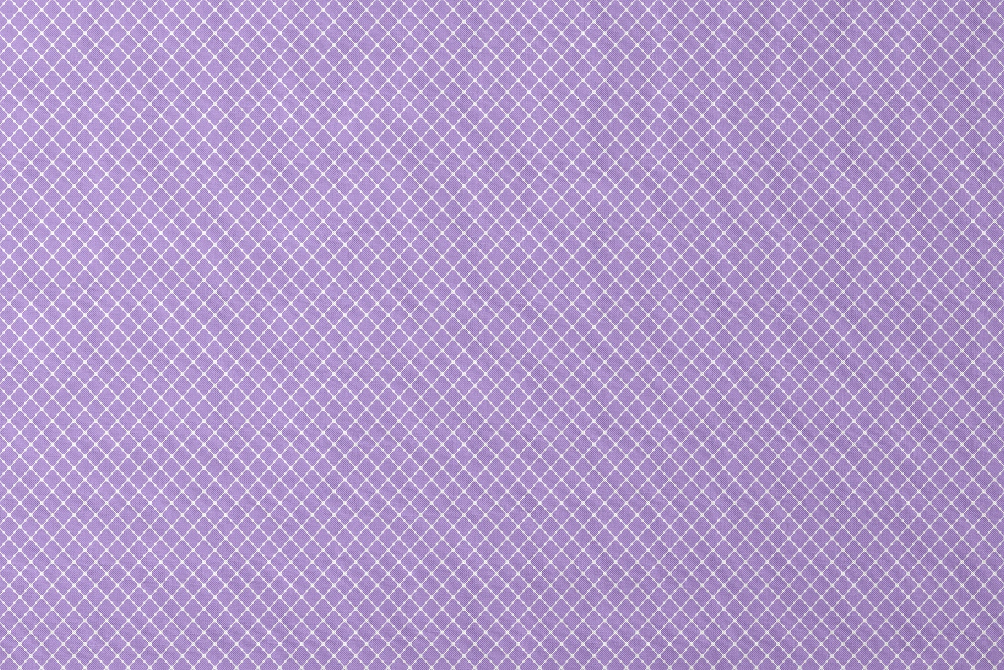 Purple quatrefoil pattern with white lattice grid on lavender background designs flat mockup