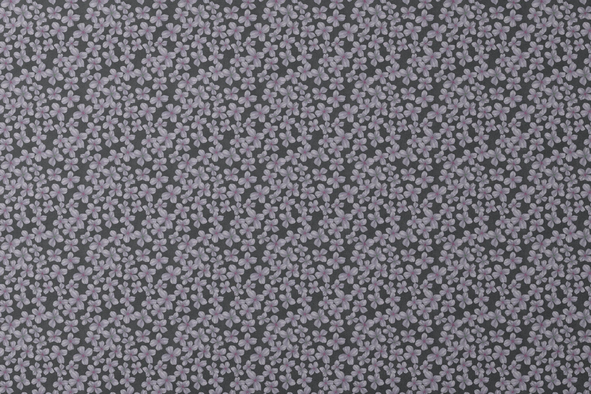 Hand-drawn purple flowers scattered on a charcoal background, designed by Nicole Tamarin. designs flat mockup