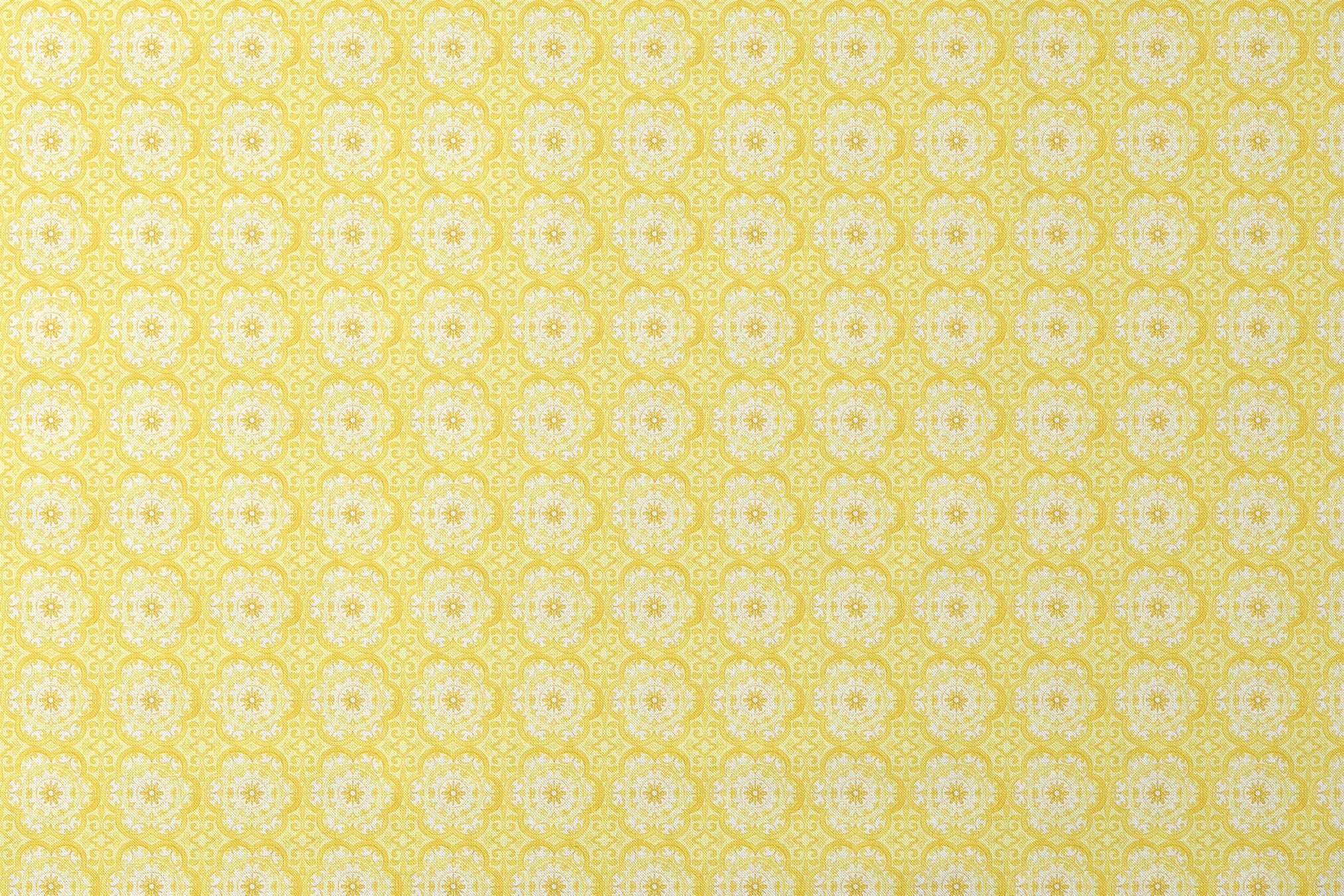 Bright yellow decorative pattern with white floral medallions in repeating ornamental design designs flat mockup