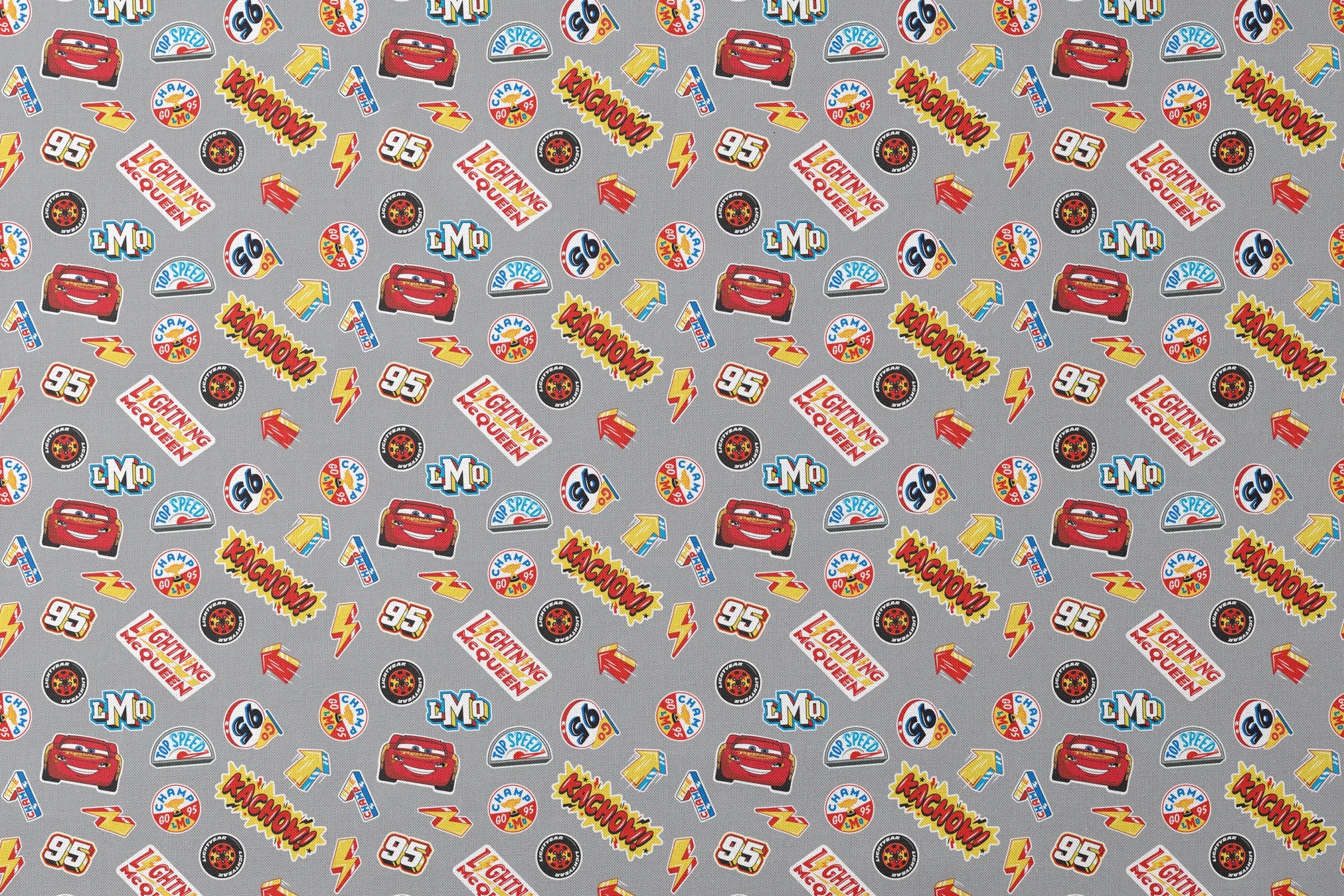 Colorful Disney Cars movie stickers featuring Lightning McQueen, racing logos, and numbers on gray background designs flat mockup