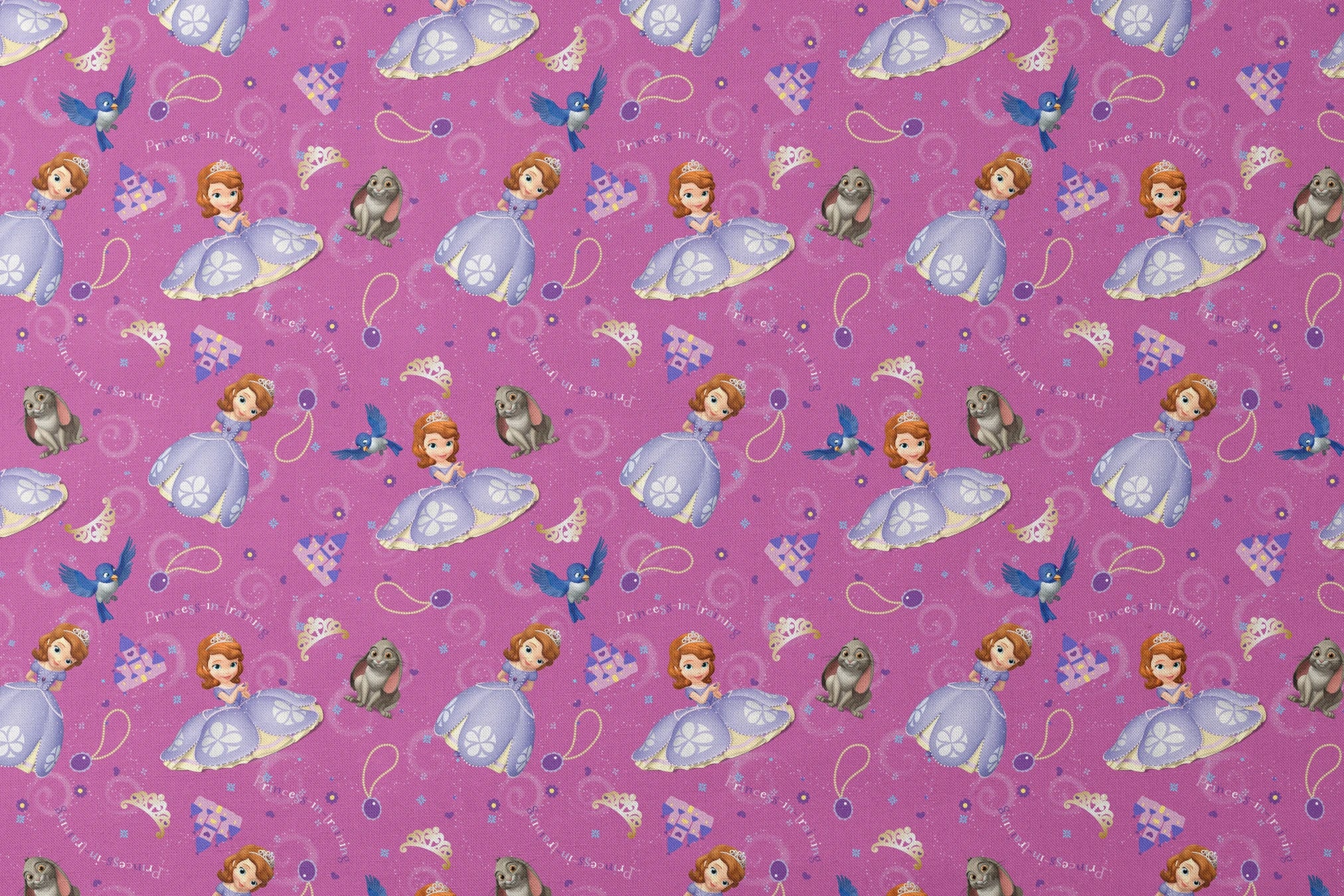 Princess Sofia pattern with purple background, crowns, castles, rabbits, and blue birds scattered among swirling designs designs flat mockup