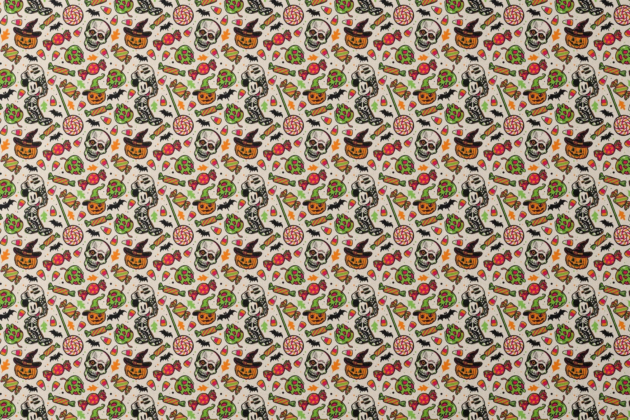 Halloween pattern with skulls, pumpkins, candy corn, wrapped candies, lollipops, bats, and autumn leaves on cream background designs flat mockup