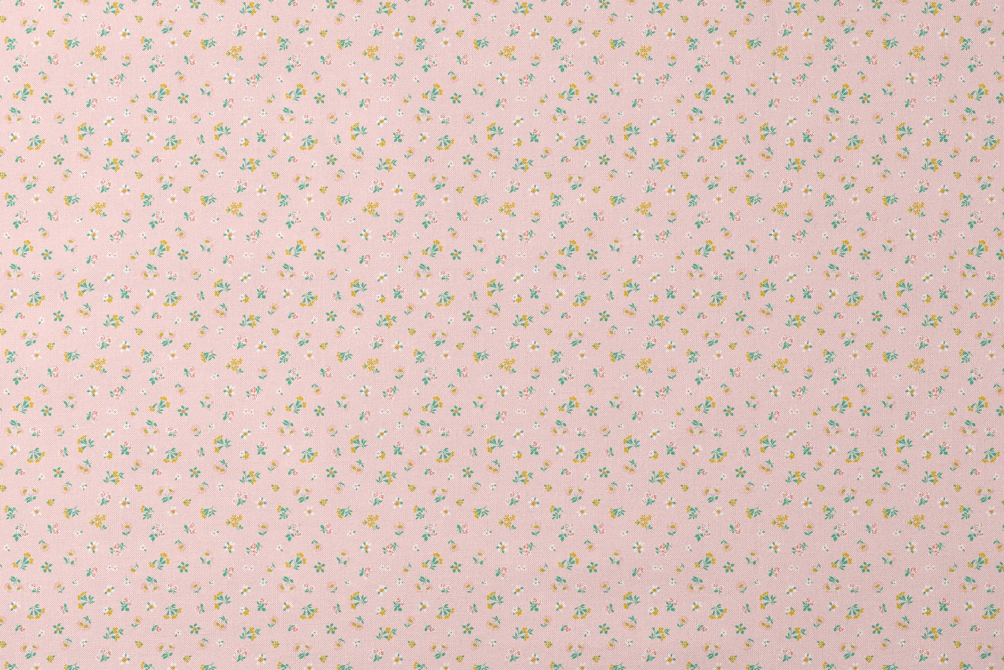 Small floral pattern on pink background with white daisies and yellow, blue, and pink flowers designs flat mockup