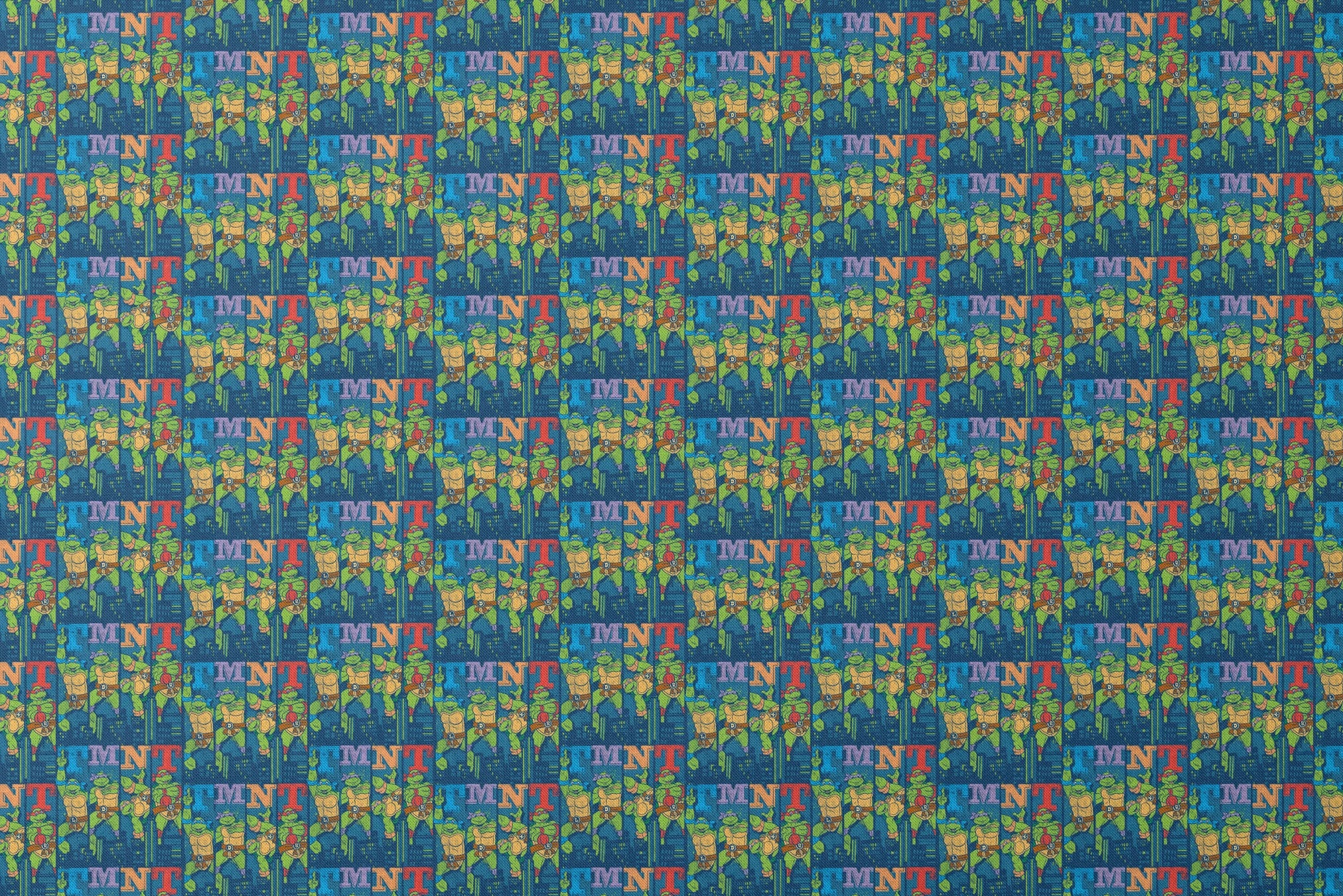 Colorful Teenage Mutant Ninja Turtles cartoon pattern with characters and "TMNT" text on blue cityscape background designs flat mockup