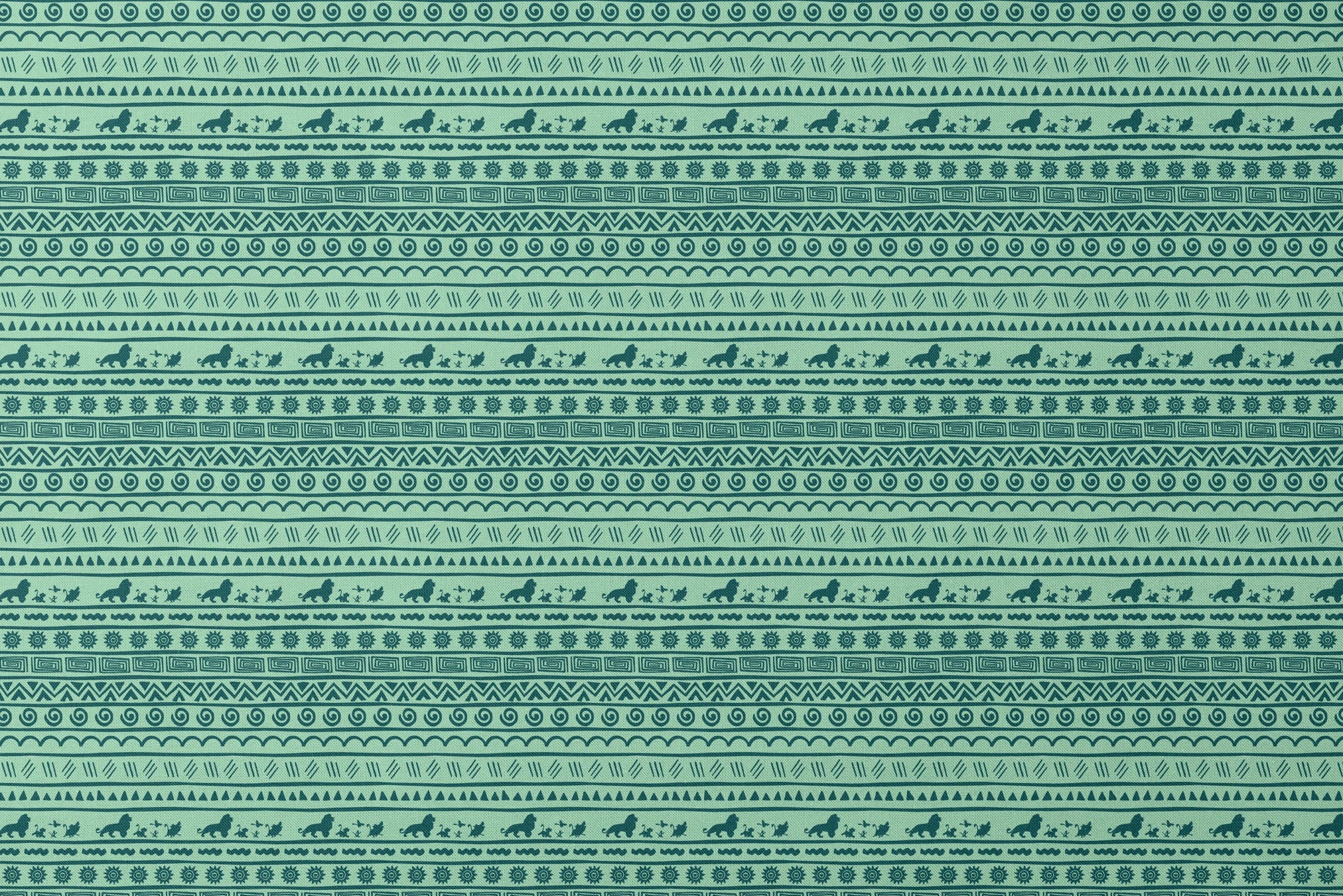 Traditional African-inspired pattern in dark teal on mint green with lions, spirals, triangles, and geometric motifs designs flat mockup